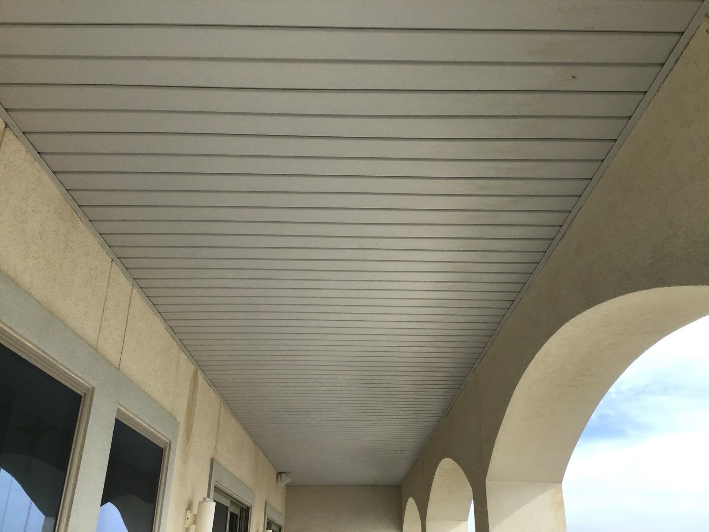 Soffit and Fascia Roof Replacement using 60' Ladders in Navarre by Gutter Professors