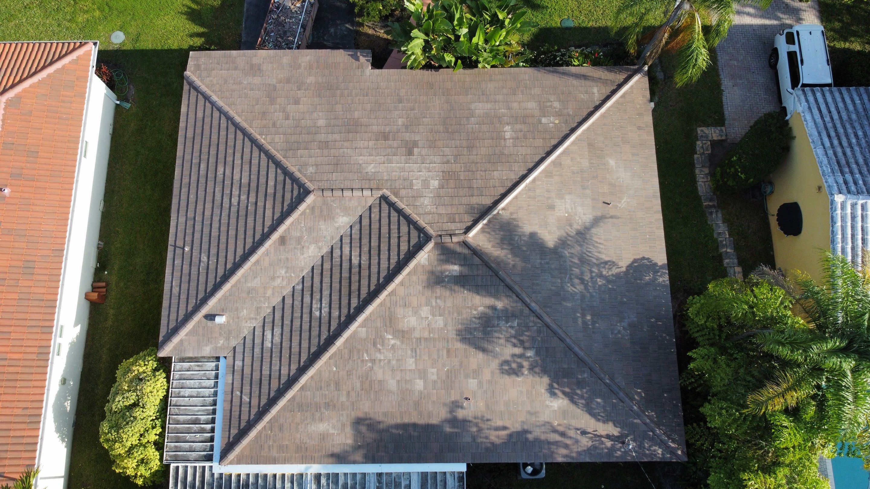 Residential Roofing Installation using 13" Flat Tile by BOB HILSON & CO INC