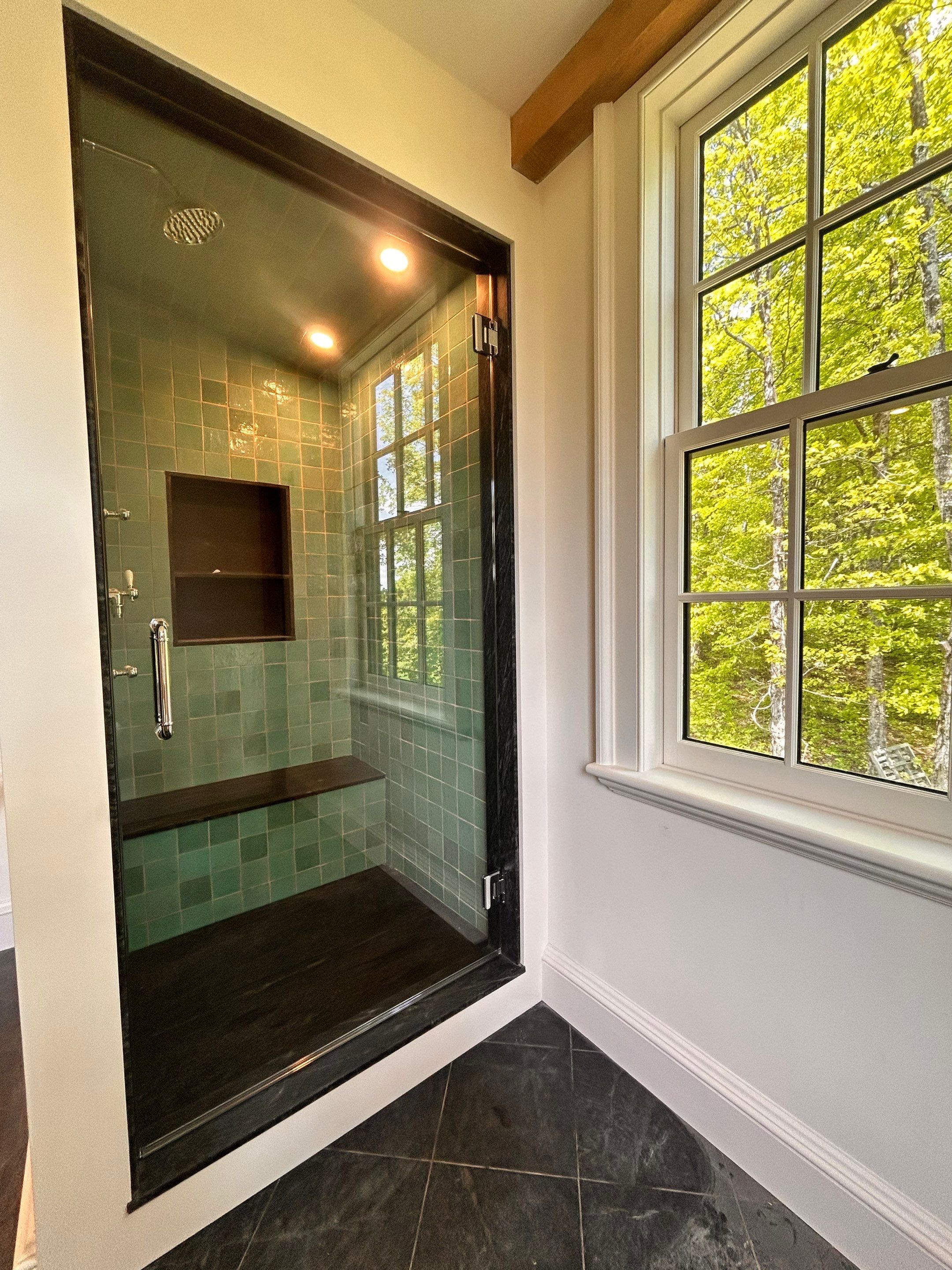 Two Showers using Tempered Shower Glass with Customer Supplied Shower Pulls by Cheshire Glass Company