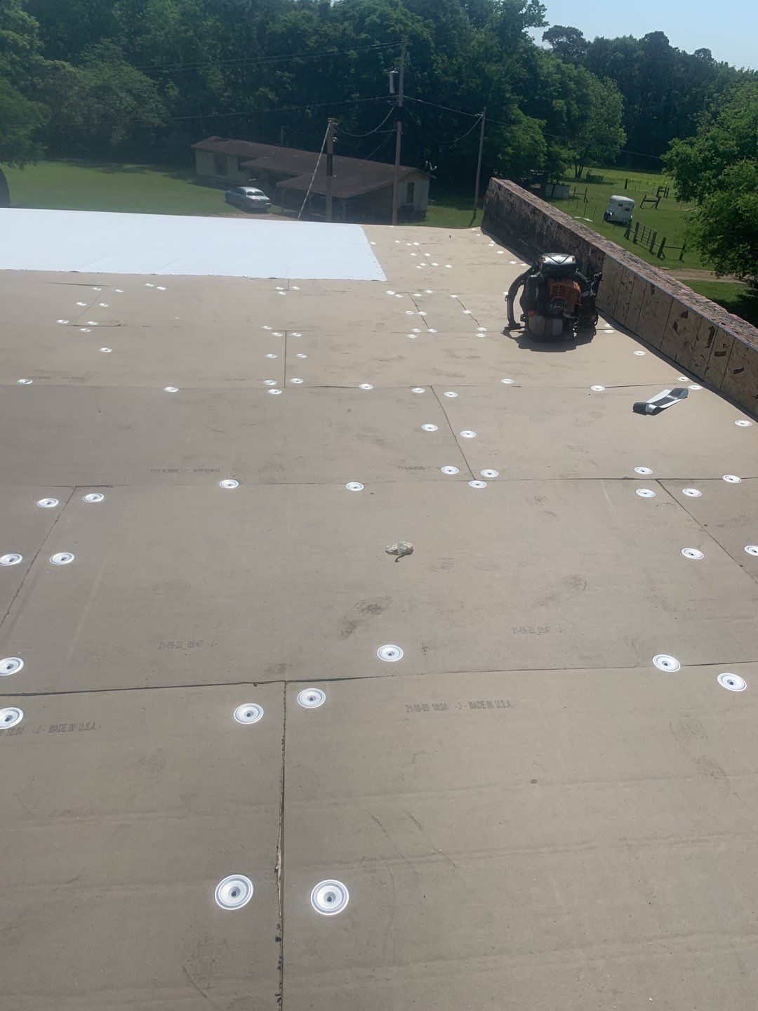 Commercial Roofing Installation using 50 mil PVC by Hostetler Roofing