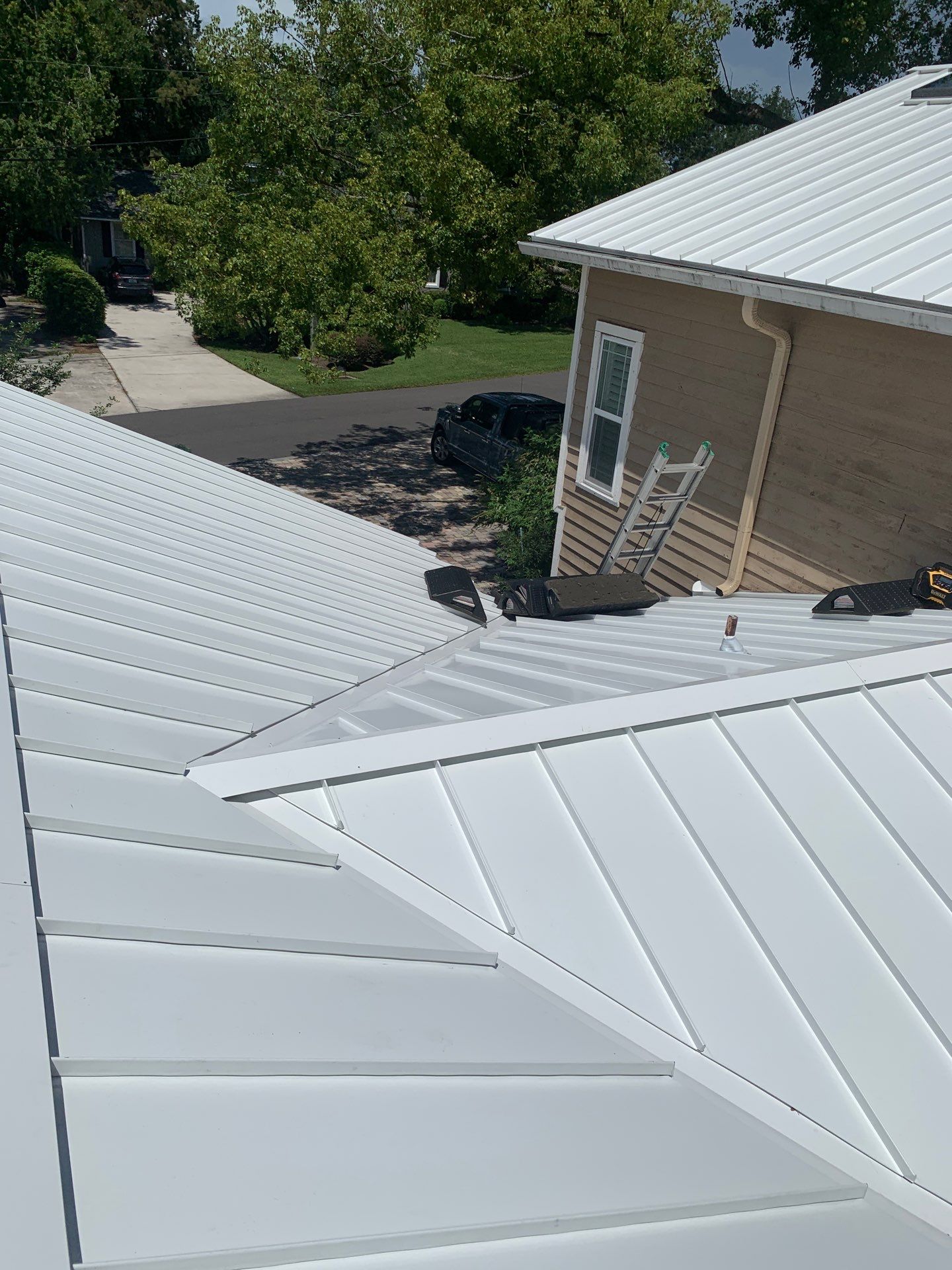 Shingle -> Metal by Prime Roofing