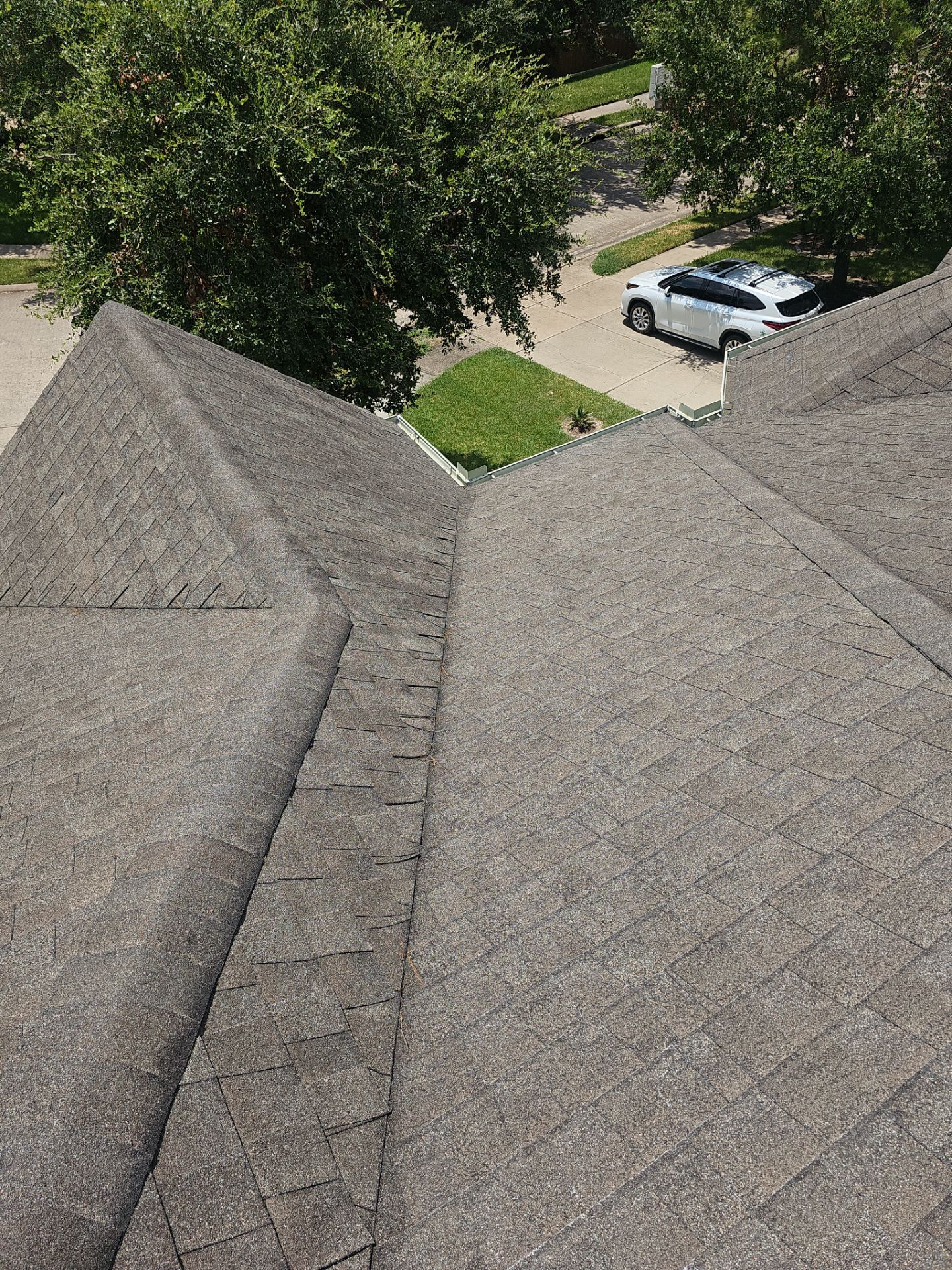 Hail Damage using Owen's Corning Duration (Lifetime) Shingles by Roof Repair Company