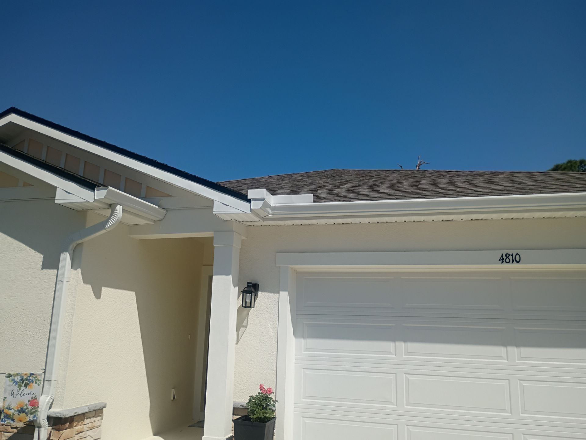 6-inch K-style White Seamless Gutters with Downspouts in North Port, FL by Gutter Professors