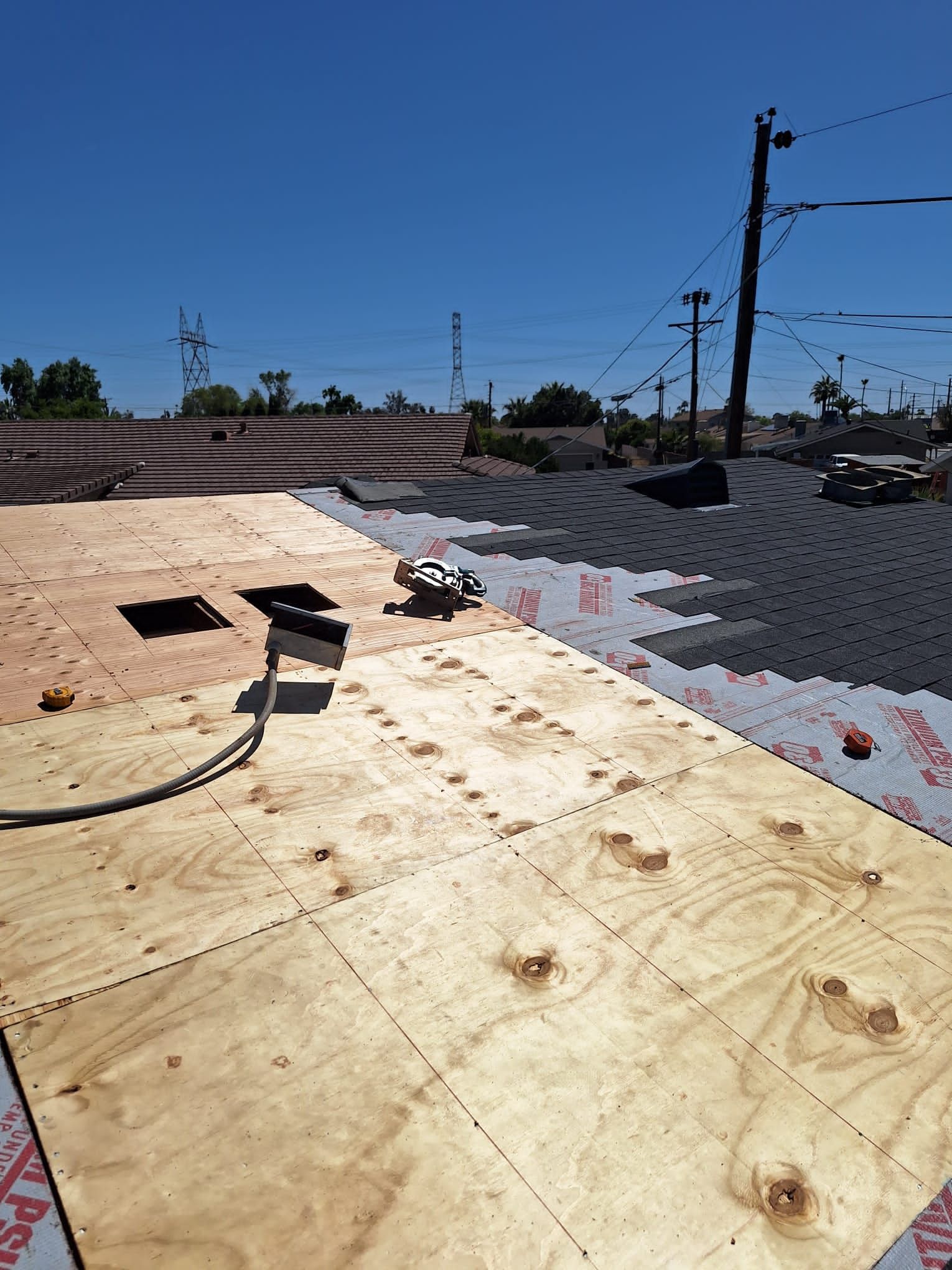 Onyx Black Shingles by Reimagine Roofing