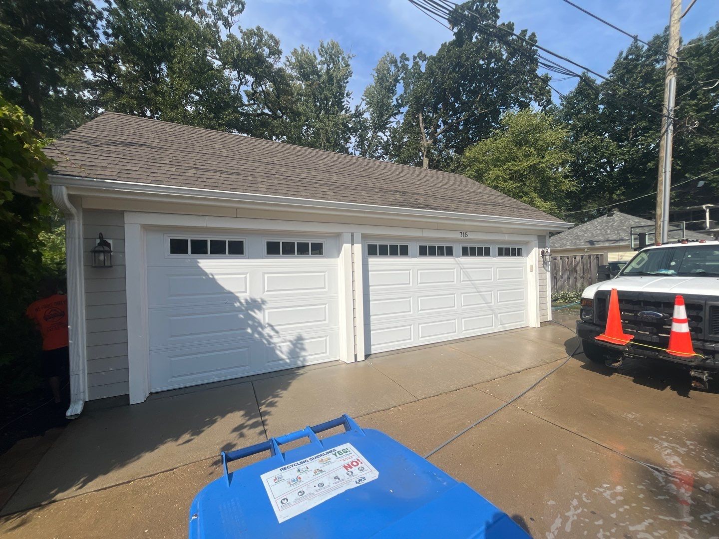 Hardie Board House & Detached Garage Soft Washing by Northern Power Washing LLC.