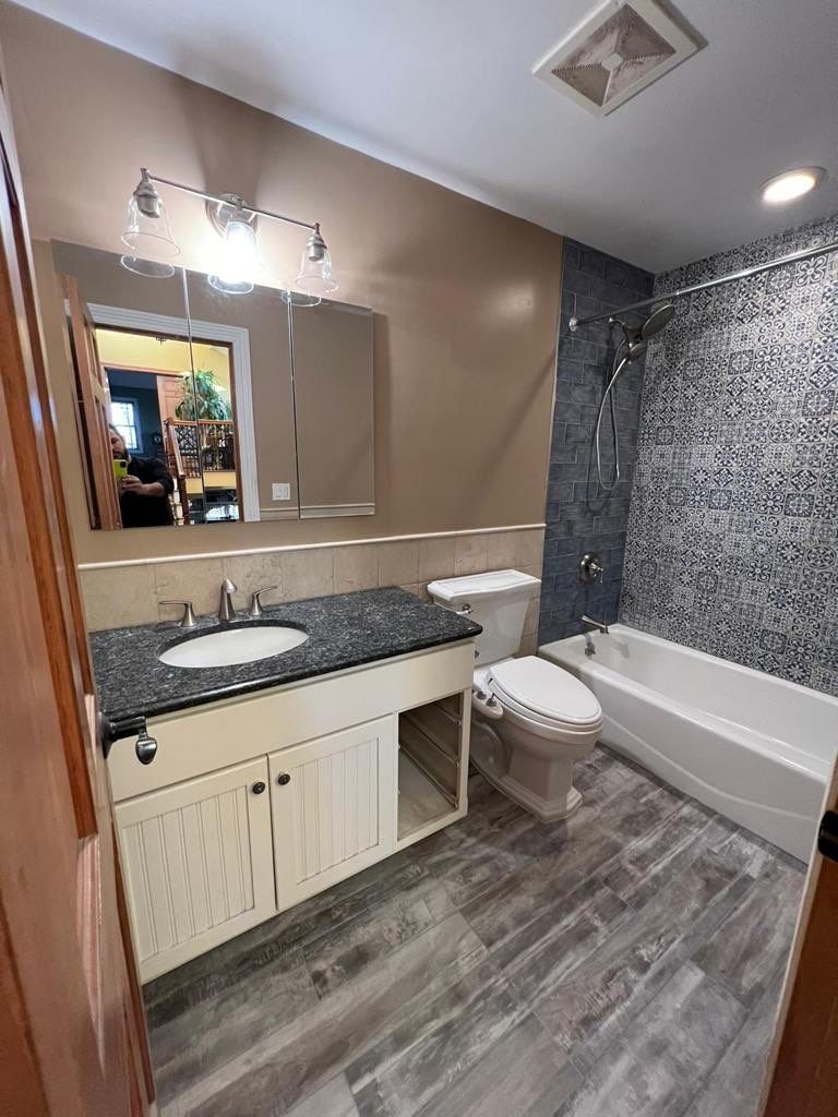 Bathroom Remodel using Tile by Home Concepts Construction