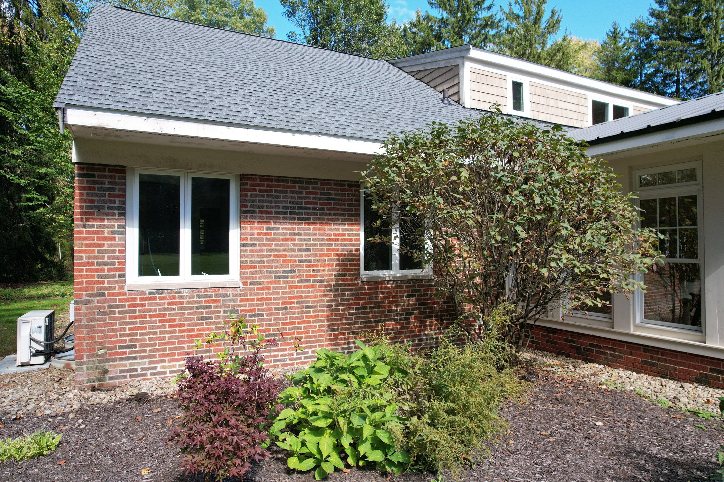 Moreland Hills Roof + Gutters Replacement by Atlas Roofing & Restoration