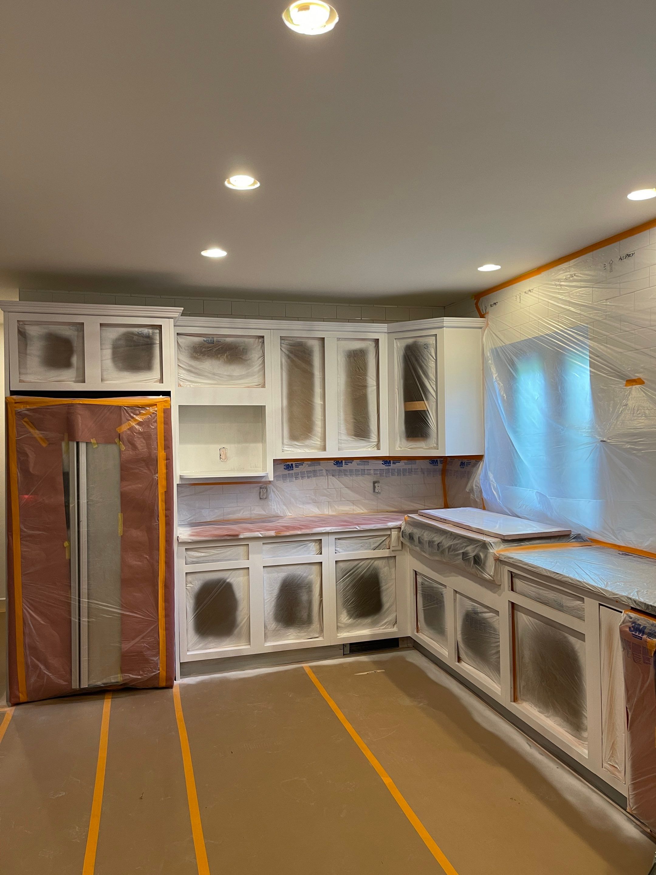 Kitchen Cabinet Painting using Milesi 2k by Trendy Walls Inc.