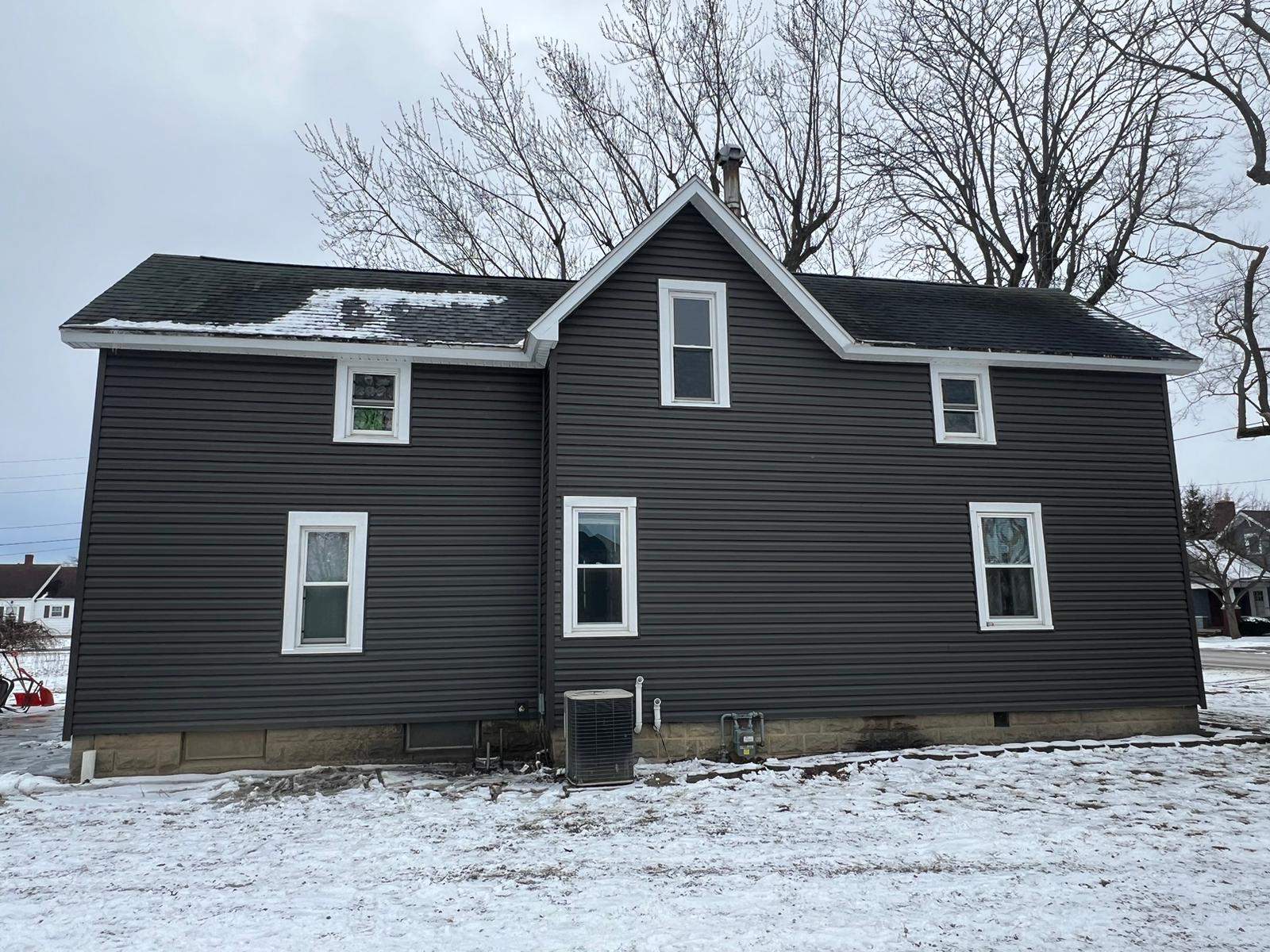 Residential fascia replacement using Exterior Portfolio 4.5 DL - Peppercorn by Nitro Roofing and Construction