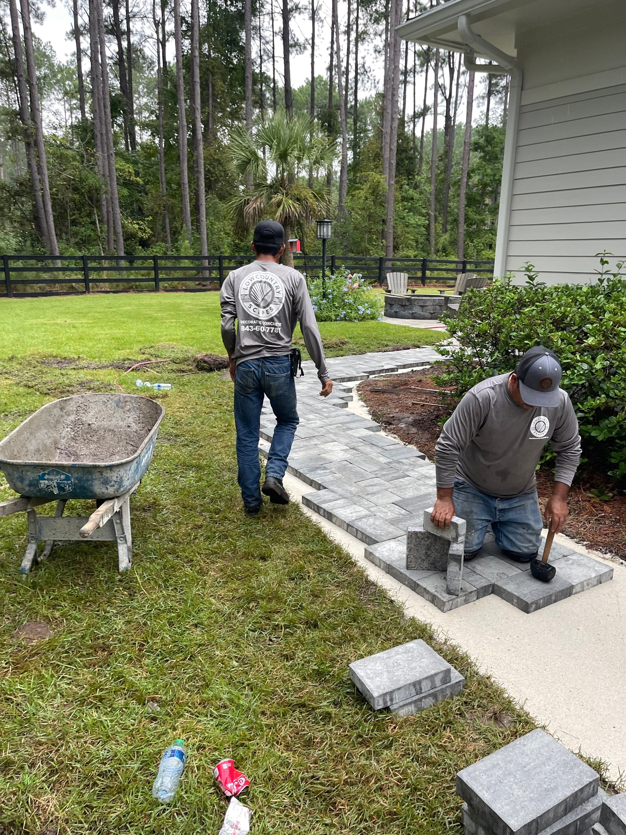 Curved Gray Paver Walkway Installation in Bluffton by Lowcountry Scapes, LLC