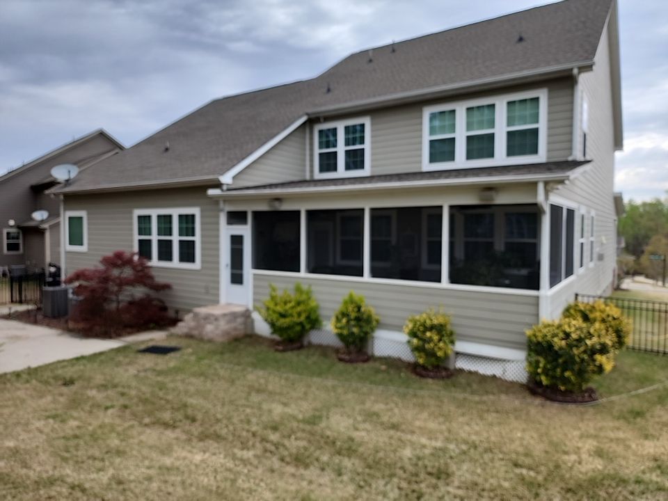 House Wash using cleaner by Power Wash Masters LLC