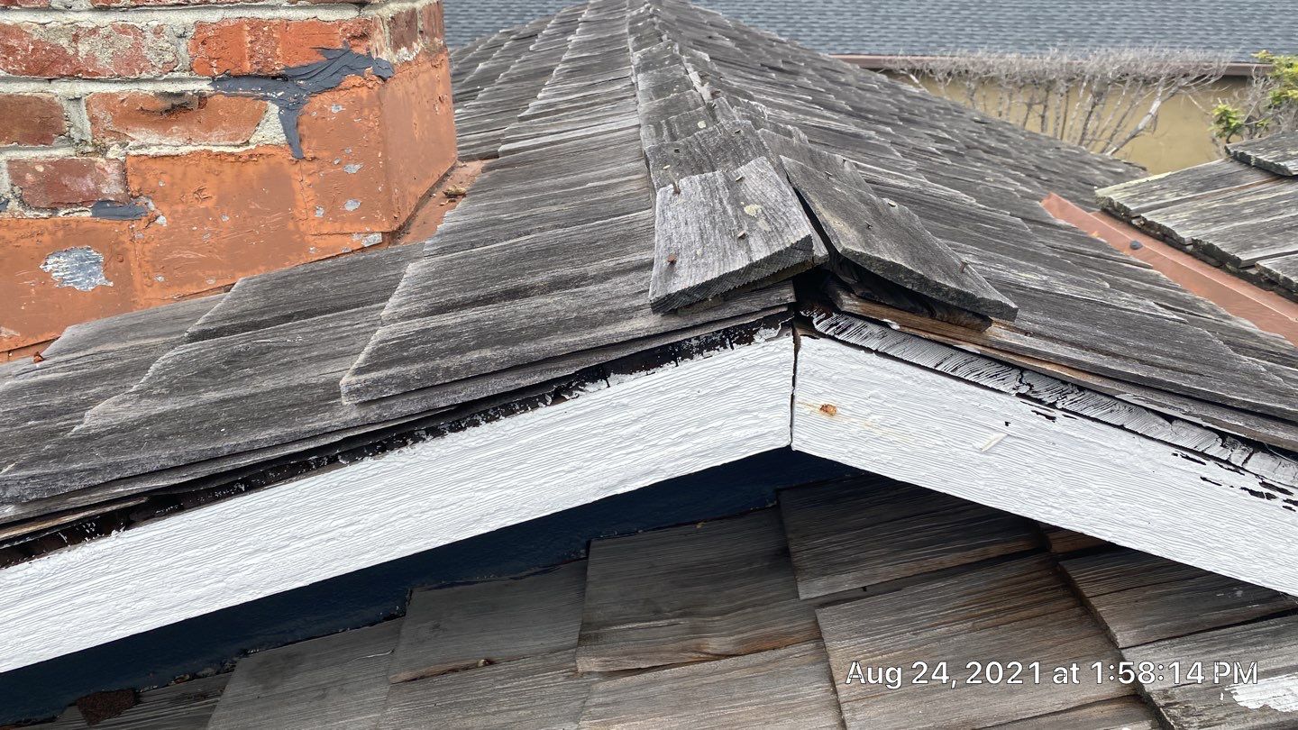 Refurbish and repair shake roof to get ready to sell by Straight Edge Roofing Inc