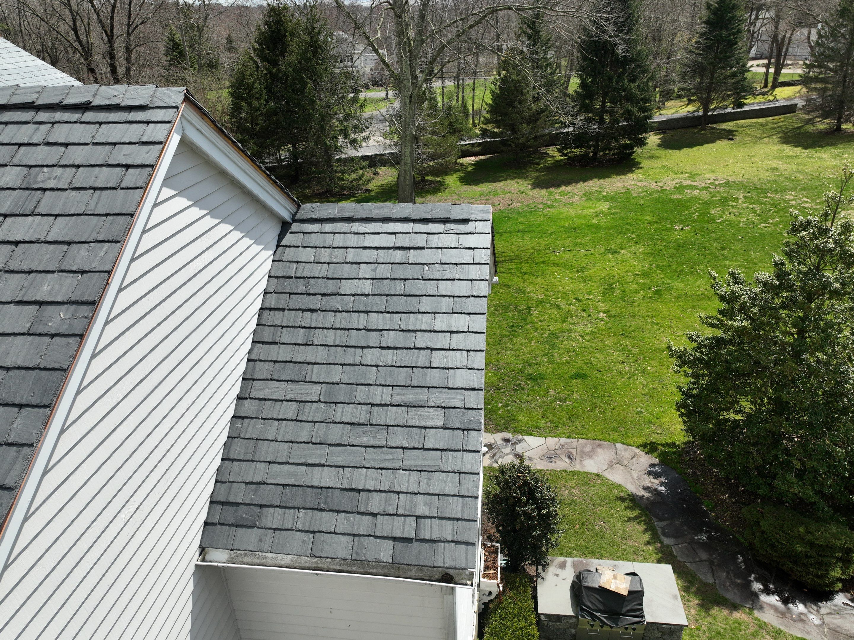 Residential Roofing Installation using Vermont Slate by A Plus Exterior