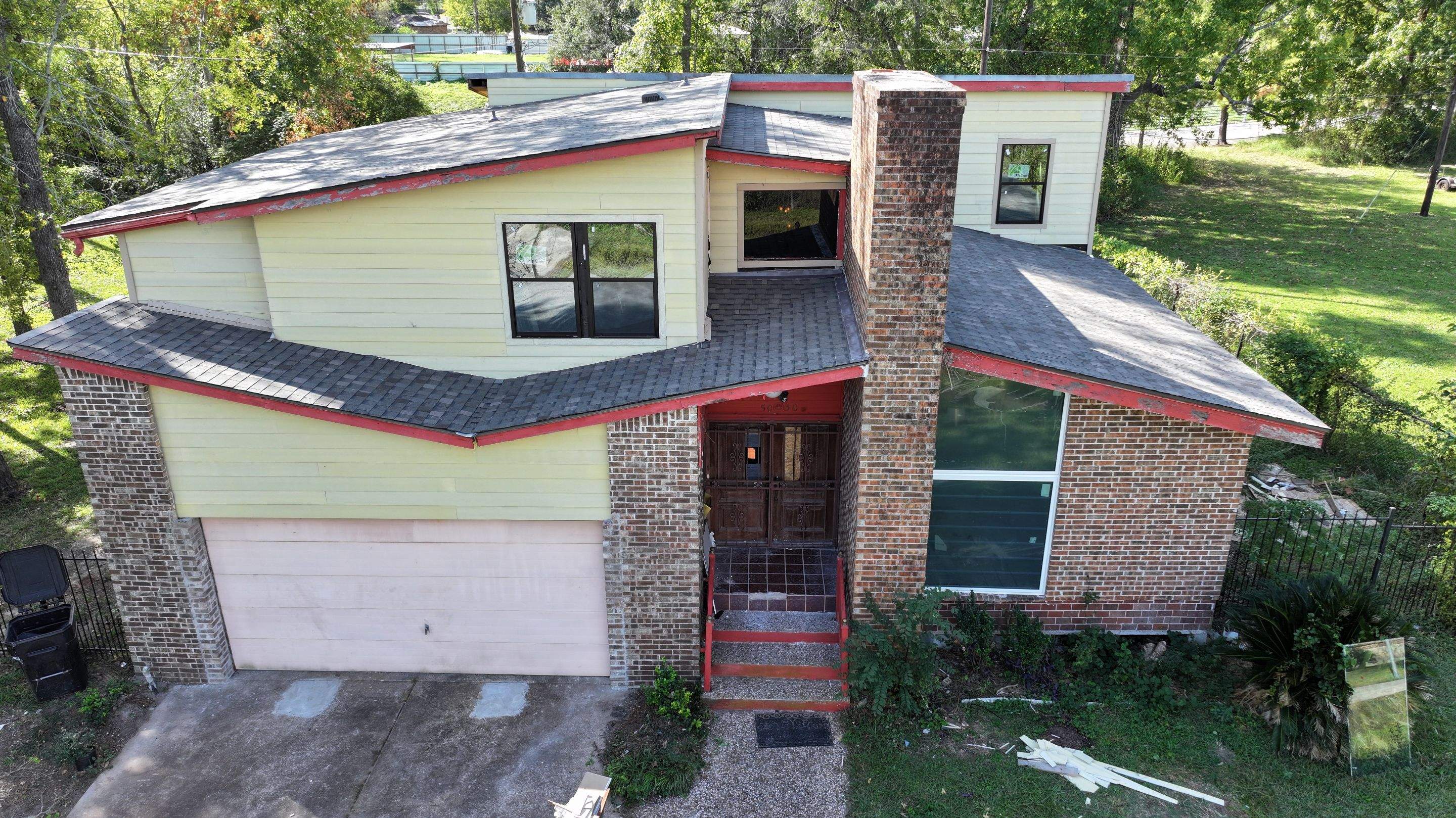 Roof Replacement with Chimney Flashing Detail — Houston, TX by PL Roofing & SB Roofing, LLC.
