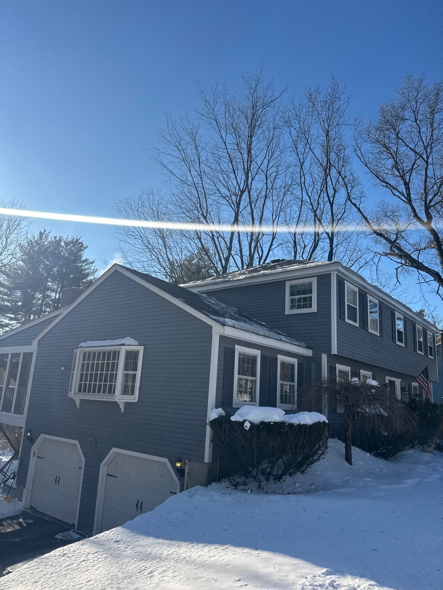 Ice Dam Removal & Snow Removal in Acton, MA by Mighty Dog Roofing of Greater Middlesex County