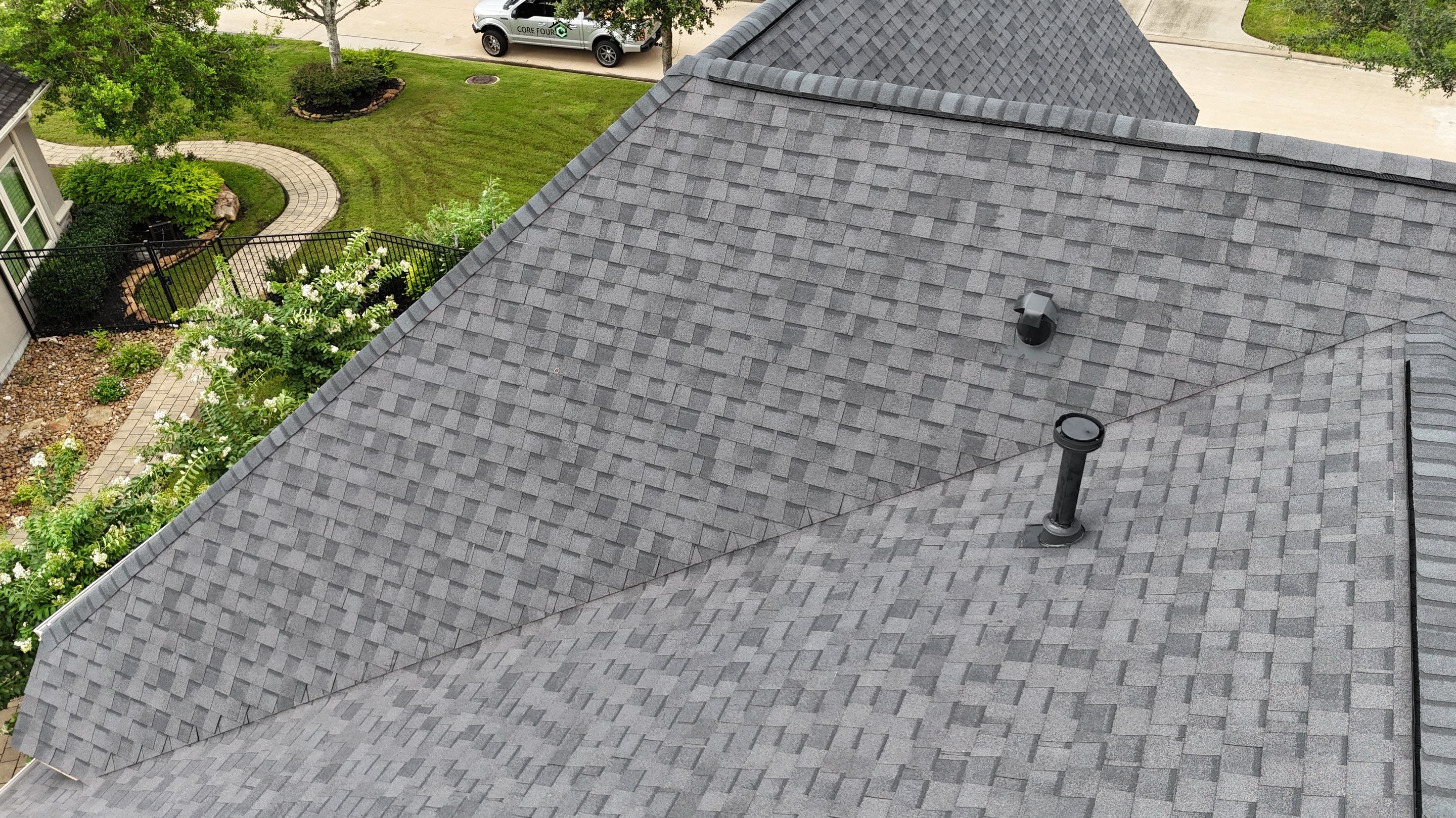 Residential Roofing Installation using Certainteed Landmark after last year's tornado in Cypress by Core Four Roofing