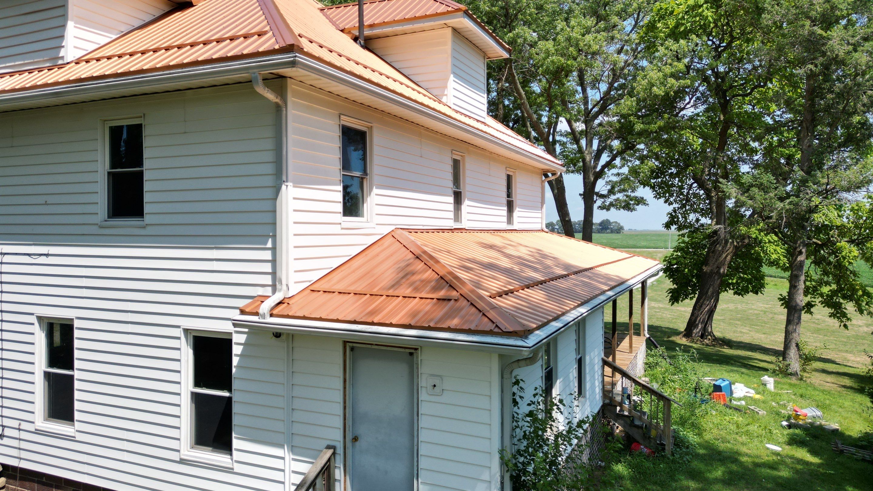 Residential Roofing Installation using Performance Panel Metal - Copper Metallic by RoofX 