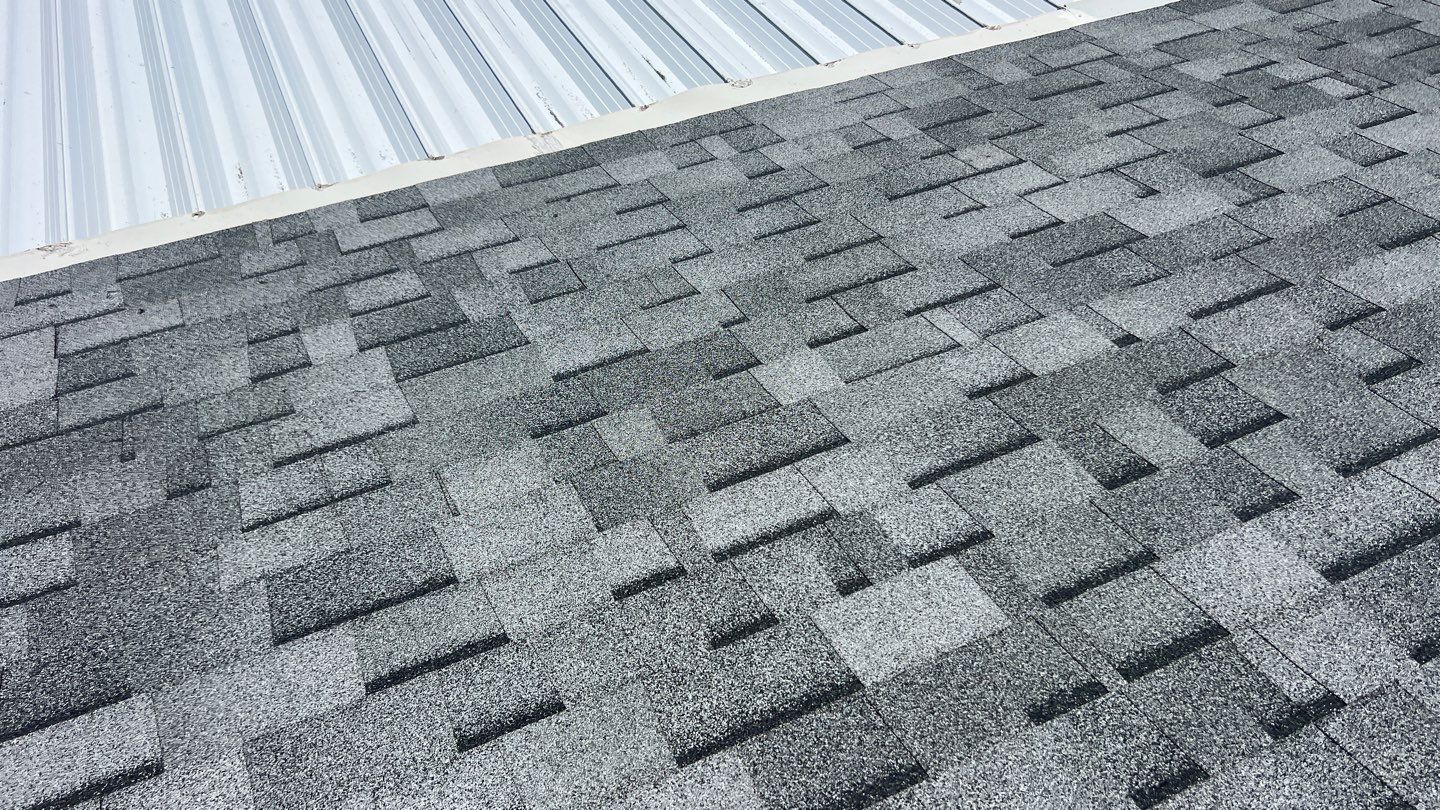 Estate Gray Shingles by Reimagine Roofing