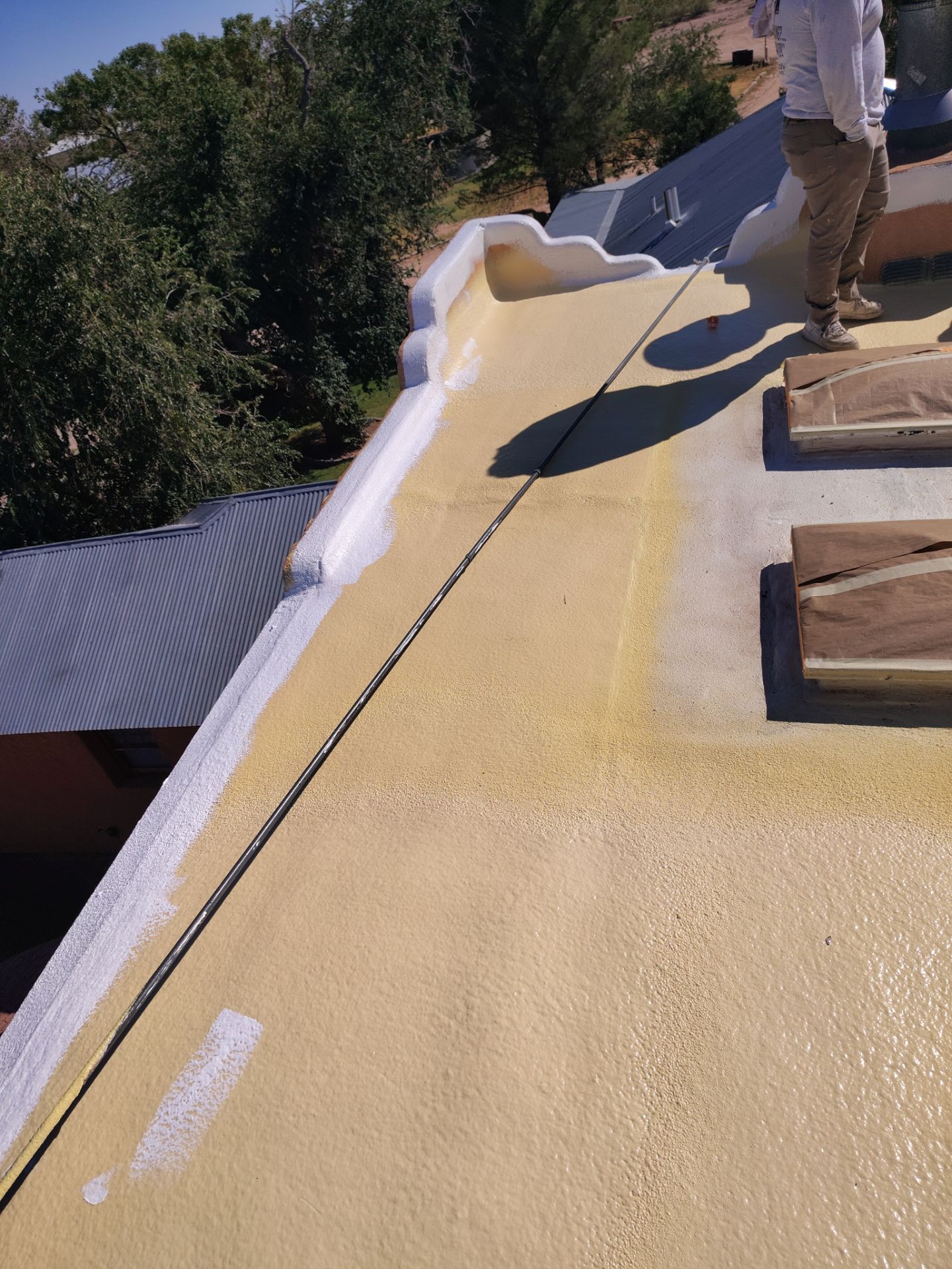 Residential roof application by SPF Services 