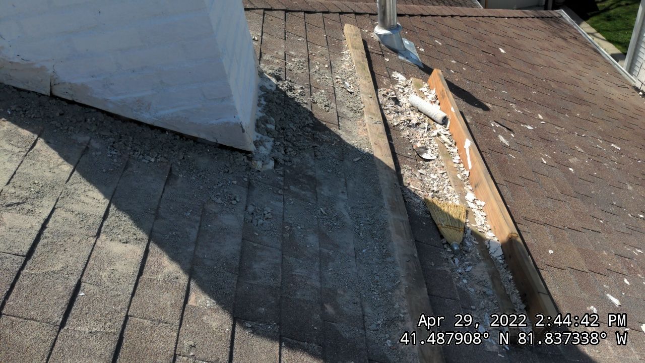 Residential Roofing Installation, Dec-tek walk-out porch roof, siding on garage by Absolute Roofing and Construction