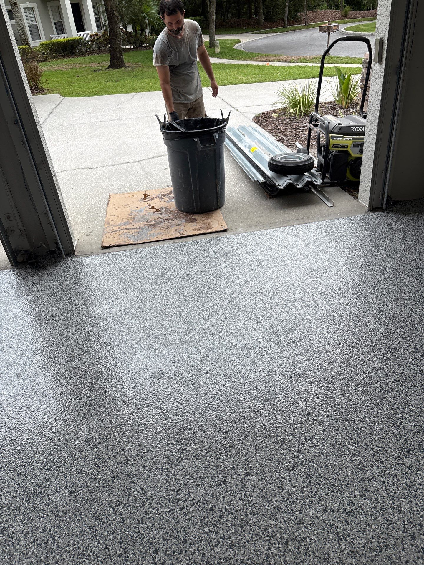 Tampa 2-Car Garage Transformation by Performance Floors & Coating