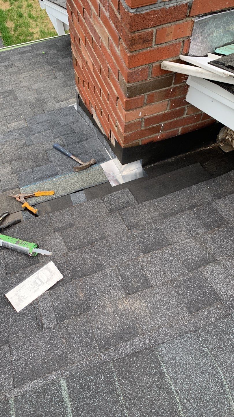 Residential Roofing Repair using Chimney Flashing by A Plus Exterior