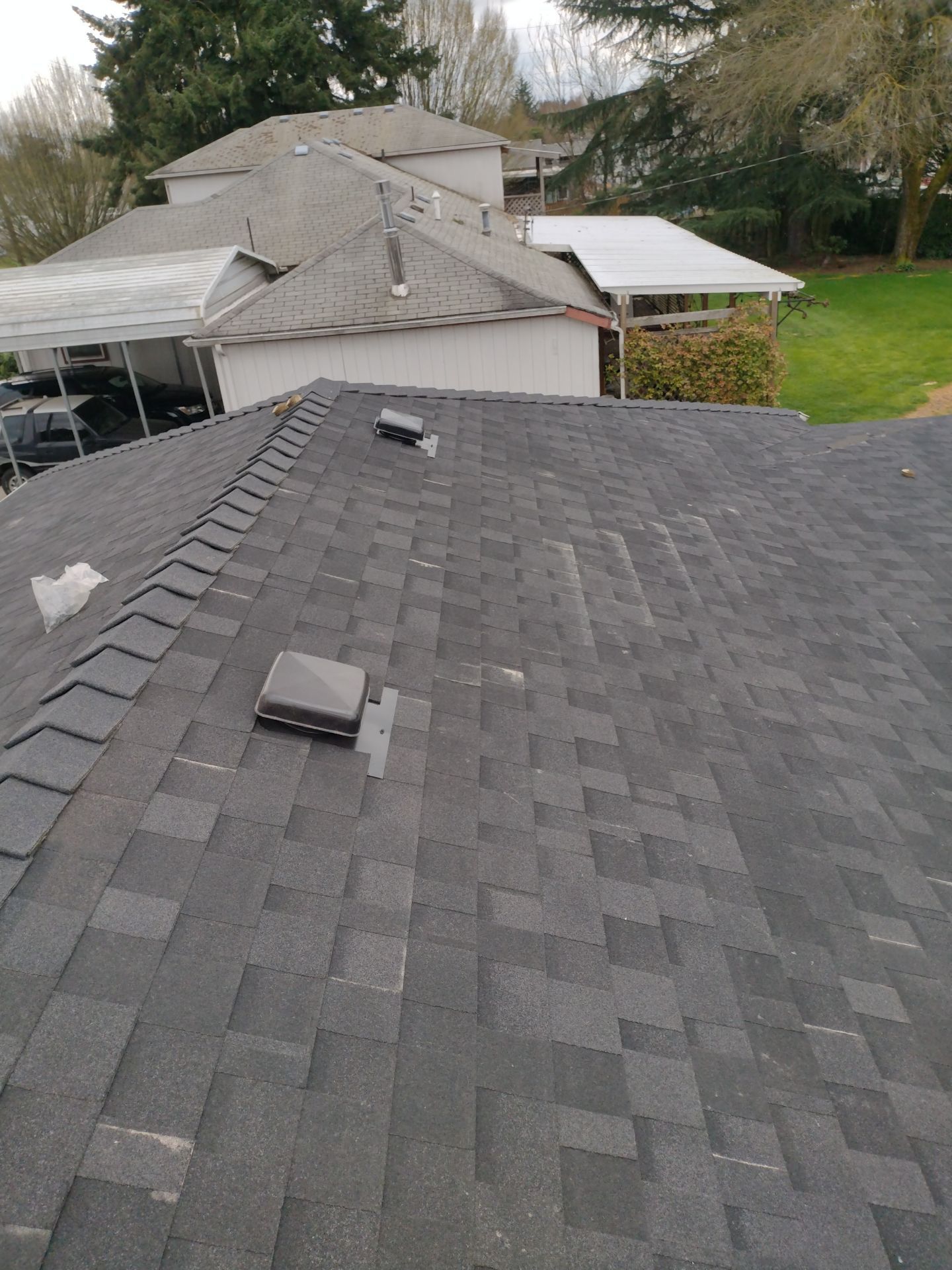 Residential Roofing Installation using IKO Dynasty (Color: Granite Black) by Orezona Building & Roofing Company, Inc.