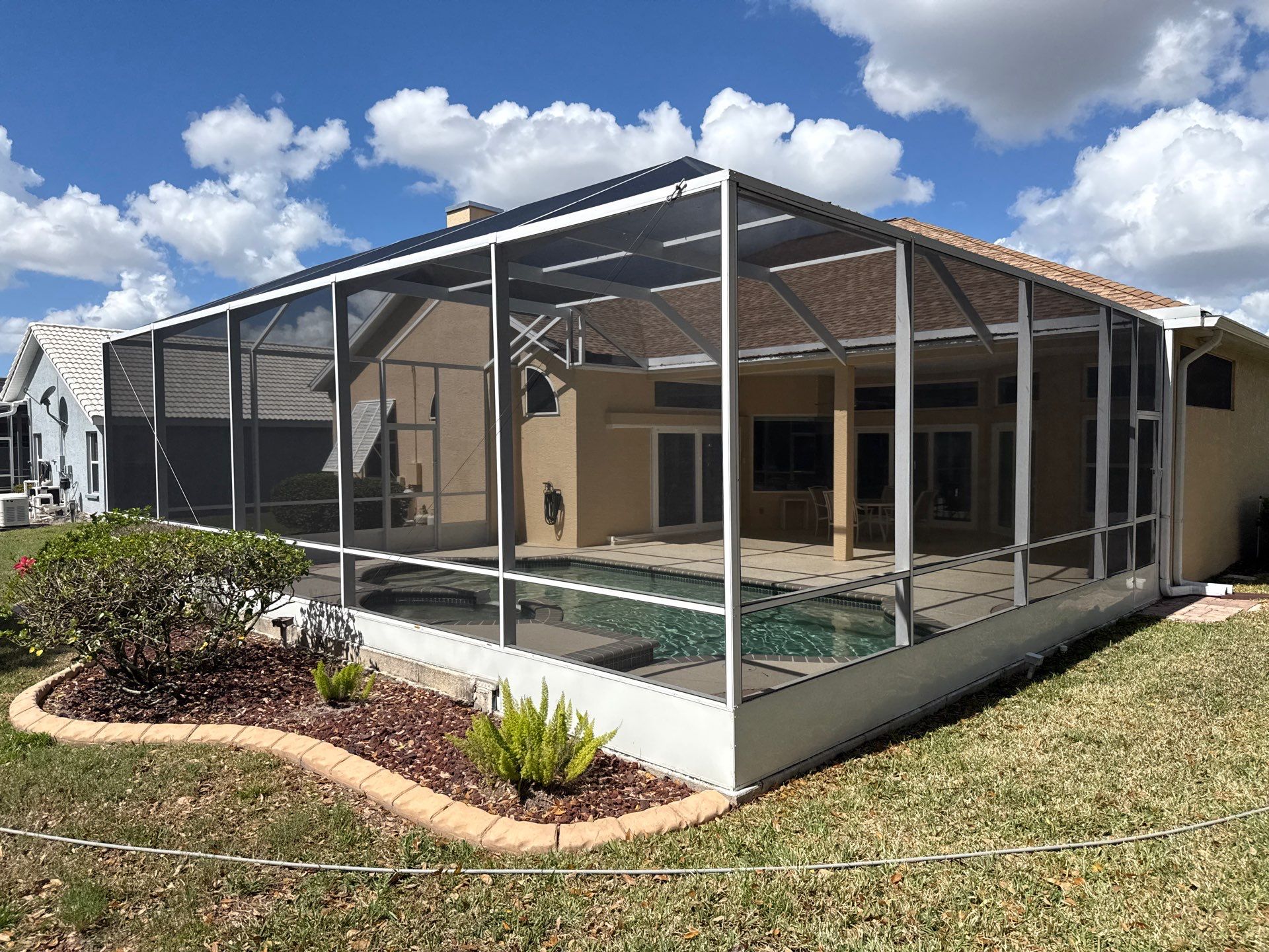 Painted Pool Deck, Pool Cage & Exterior Surface Cleaning in Creekwood – Bradenton, FL by Sunshine AquaWash