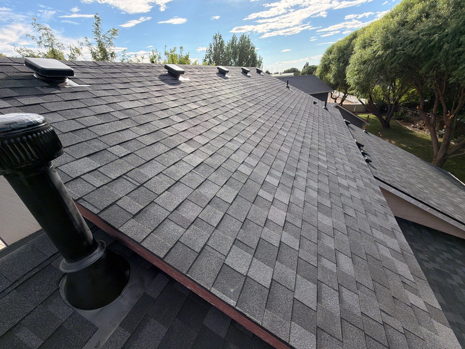 Residential Roof Replacement in Meridian Featuring Charcoal Architectural Shingles by Olive Roofing