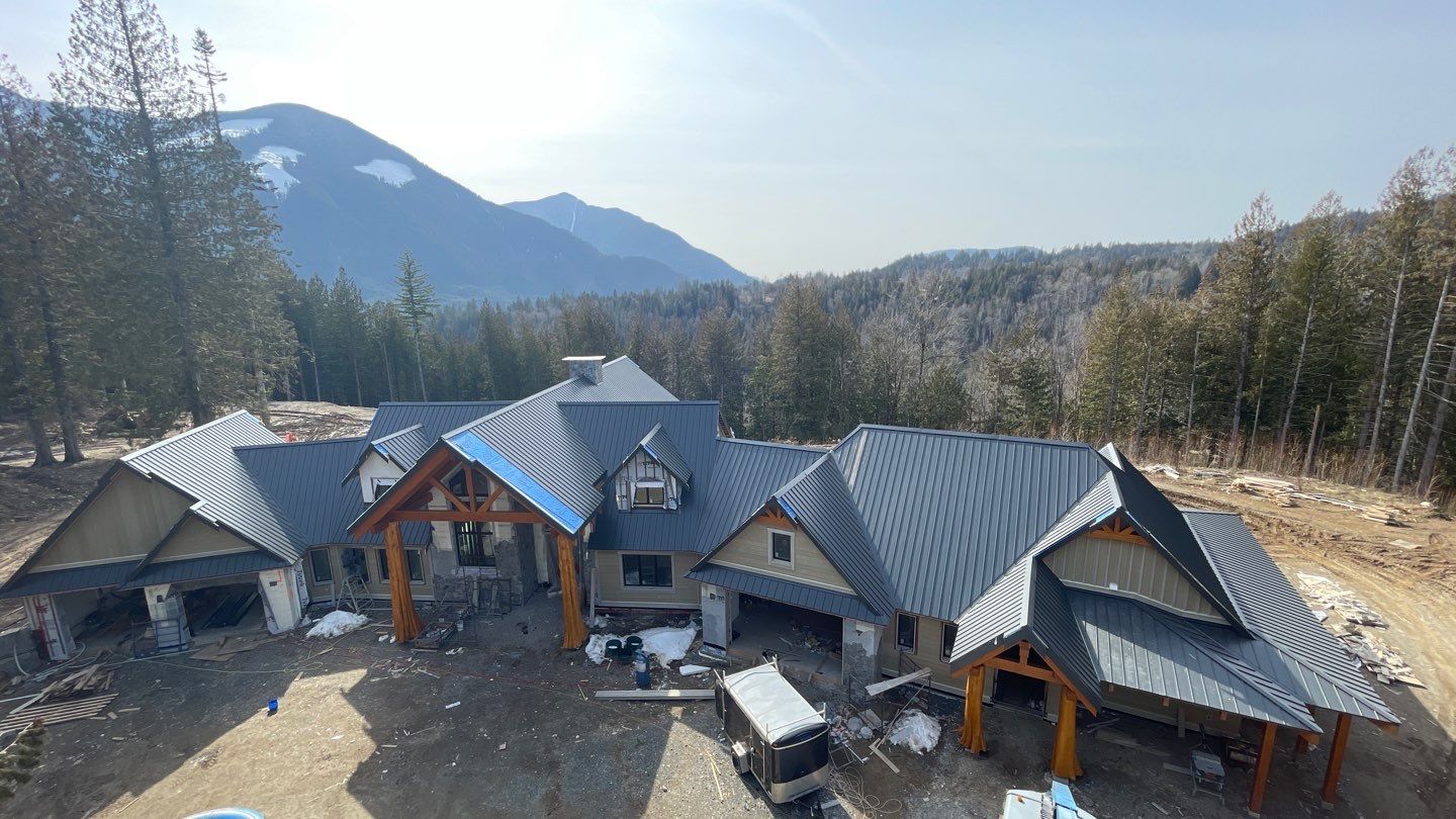 Residential Roofing Installation using 12" Prolok metal by Top Notch Roofing Inc