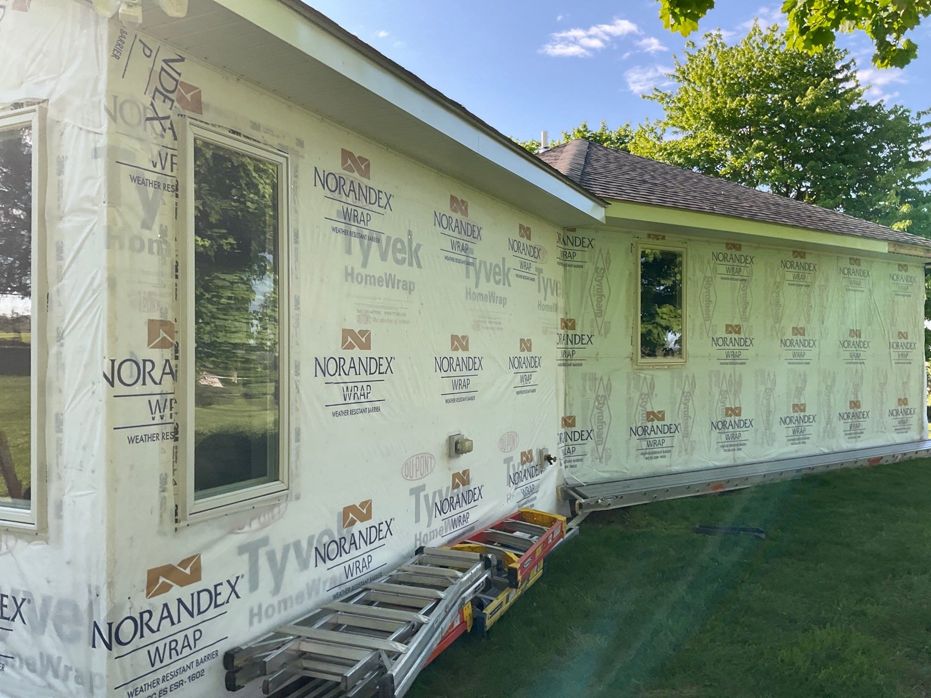 Nightfall Exterior Siding Replacement and Stone Veneer in Halifax by Esh Builders