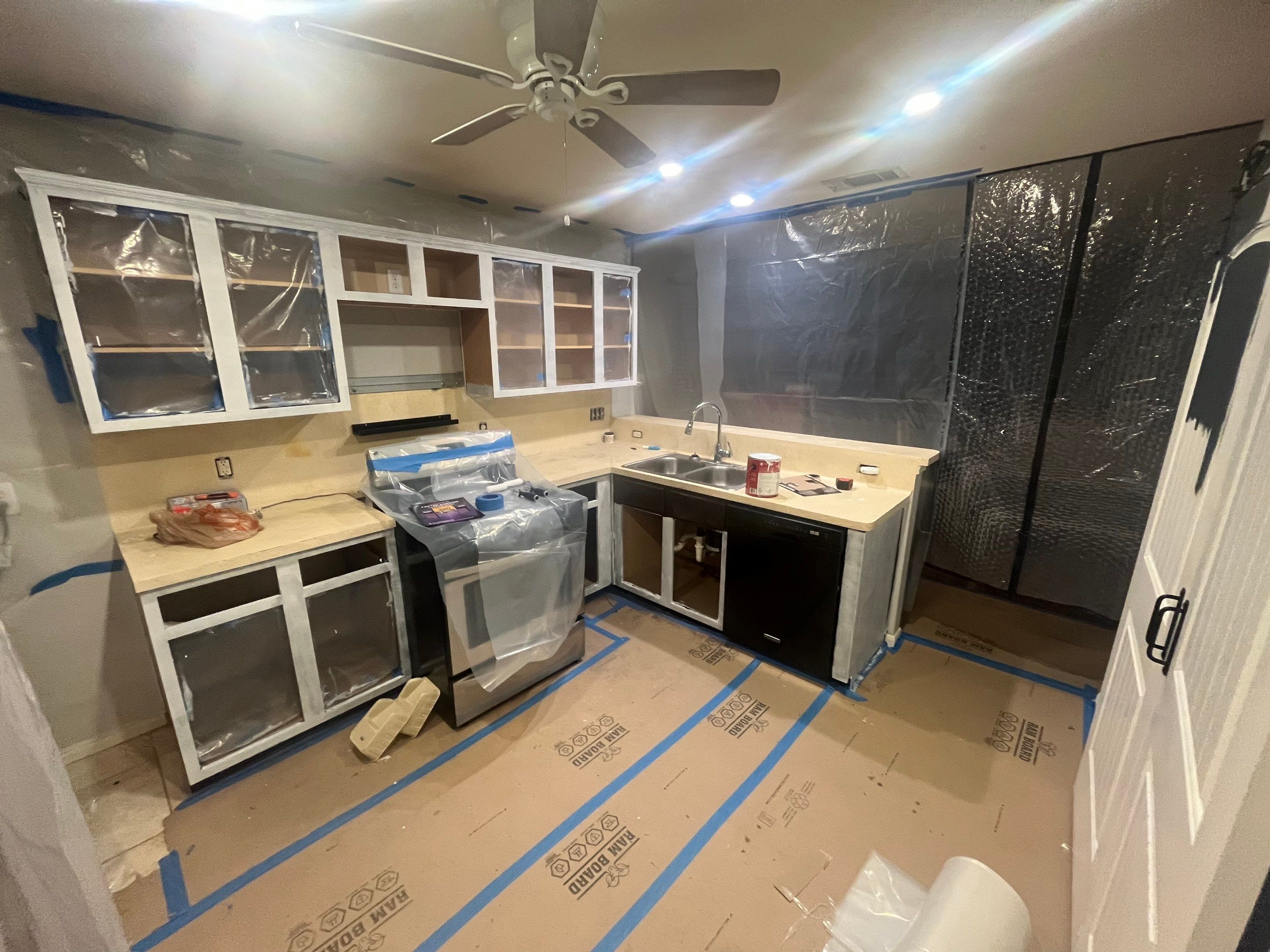 Modern Kitchen Remodel with Blue Cabinetry by Majesty Construction