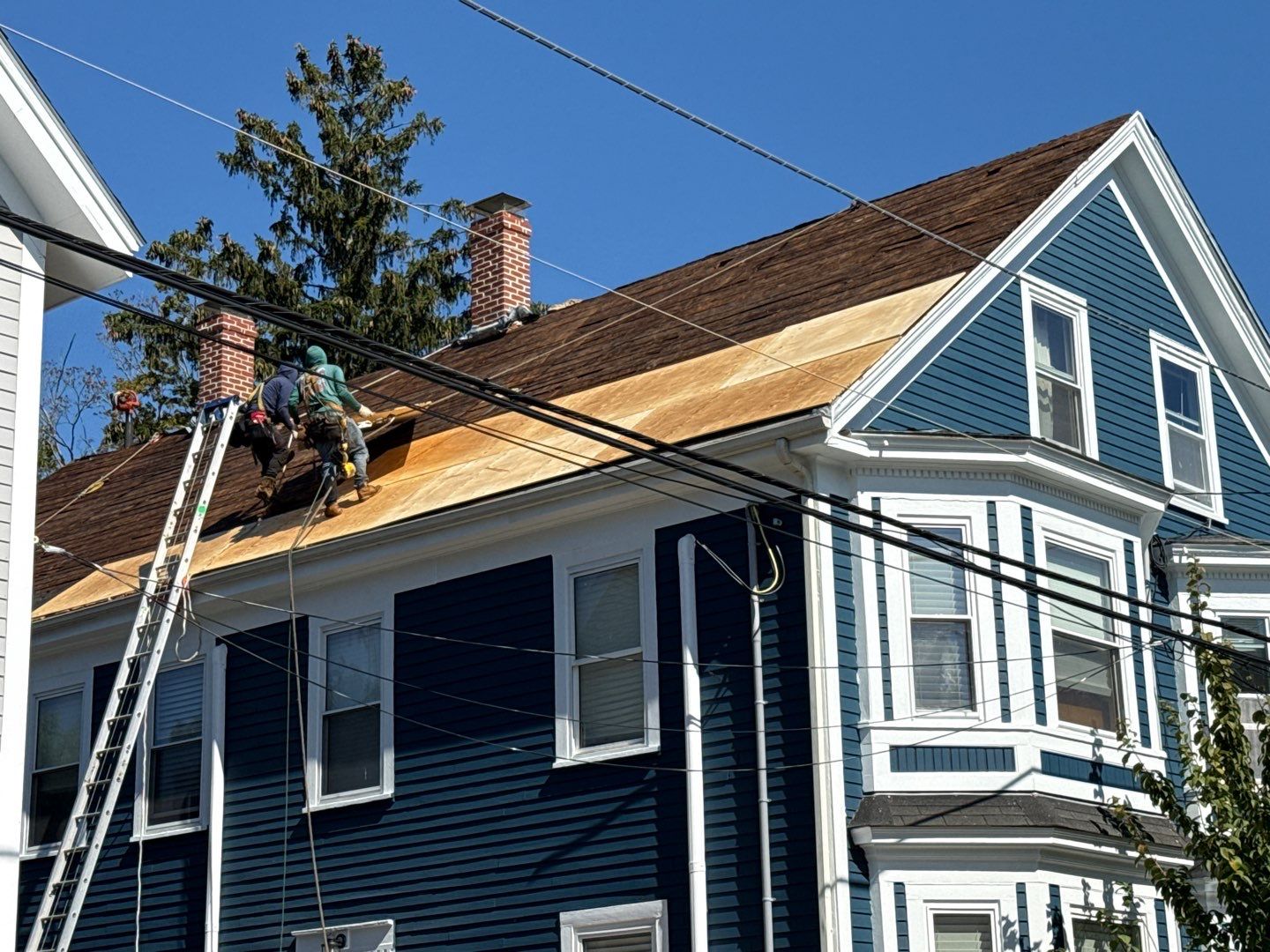 Half Roof Replacement for Solar Installation – Townhouse with New Plywood Decking by Sensible Home Solutions