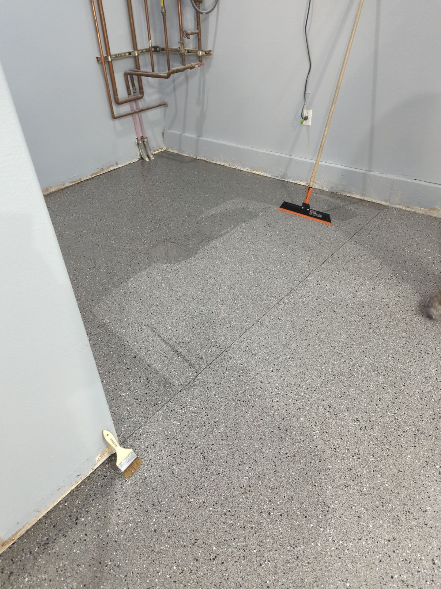 Garage Transformation using Slate Hybrid by Croc Coatings, LLC