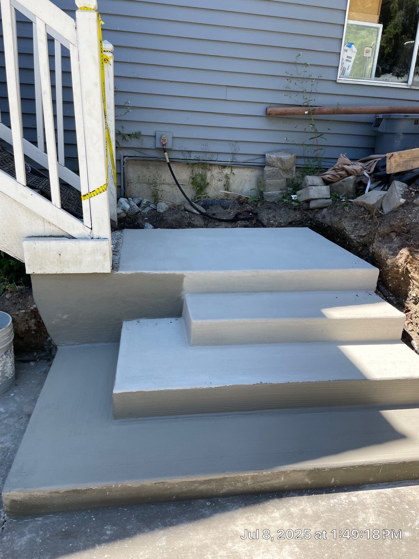 Concrete Back Patio Makeover  by Jireh Asphalt & Concrete Inc 