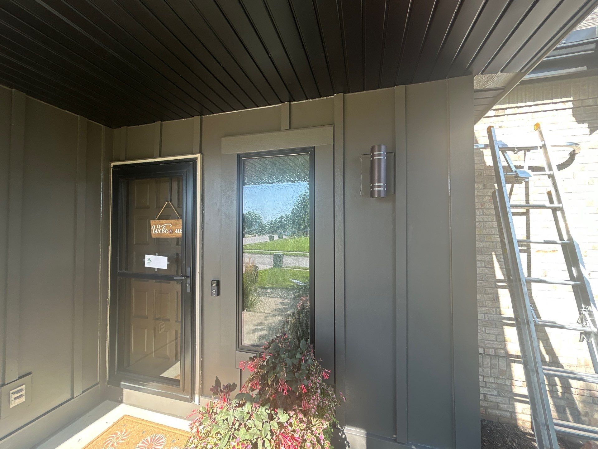 Marvin Window Replacement and Rich Espresso Hardie Siding Installation in Omaha by Carps Complete Exteriors