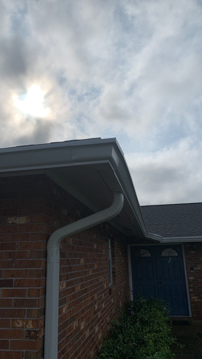 Seamless Aluminum Gutter and Down Spout Installation by Gutter Professors