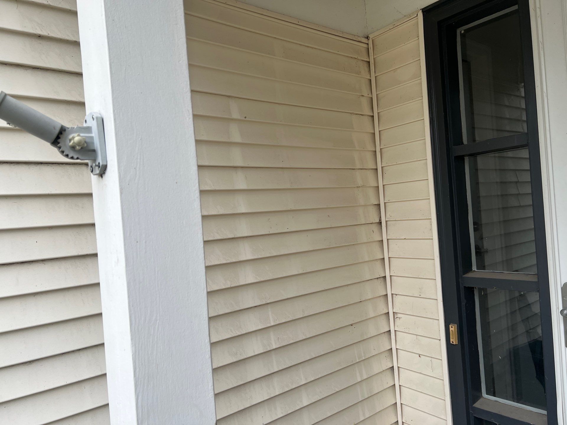 Housewashing  using Algaecide, soft wash soap by Northern Power Washing LLC.