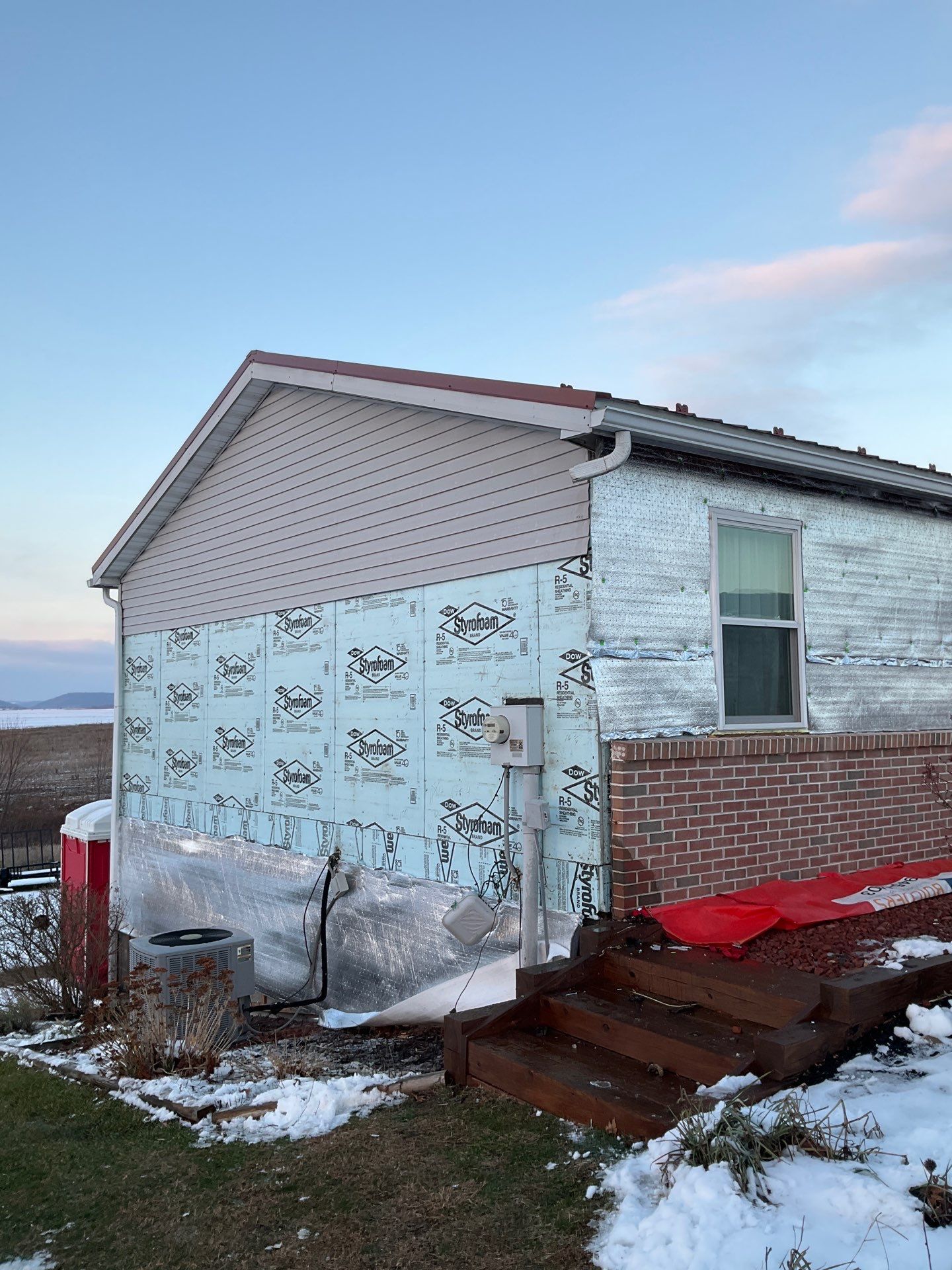 Vinyl Siding Replacement and Patio Door Installation in Elizabethville by Esh Builders