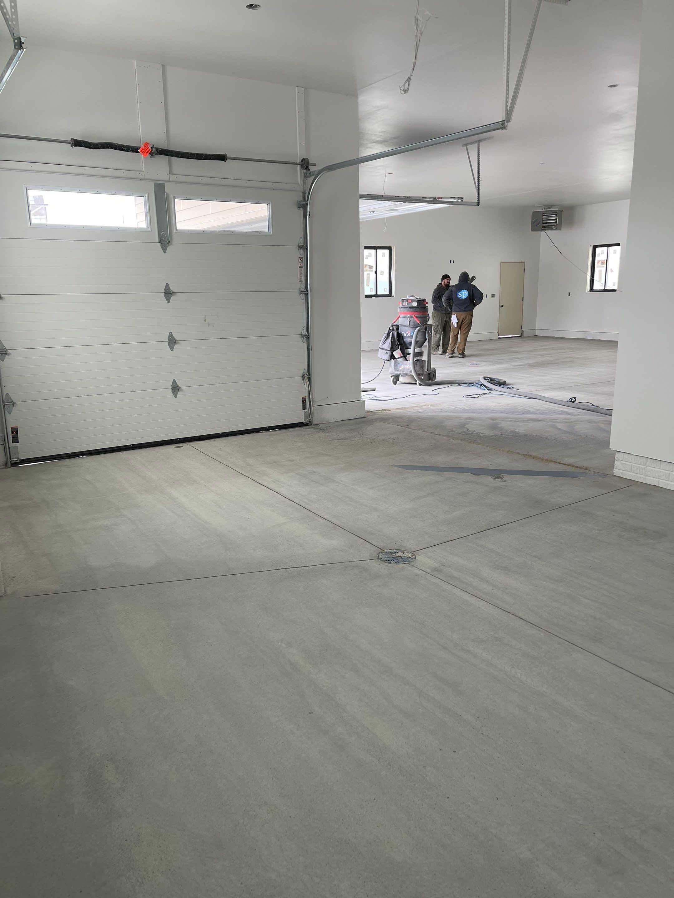 Garage using Slate Stone by Select Painting, Coatings & Garage Cabinets