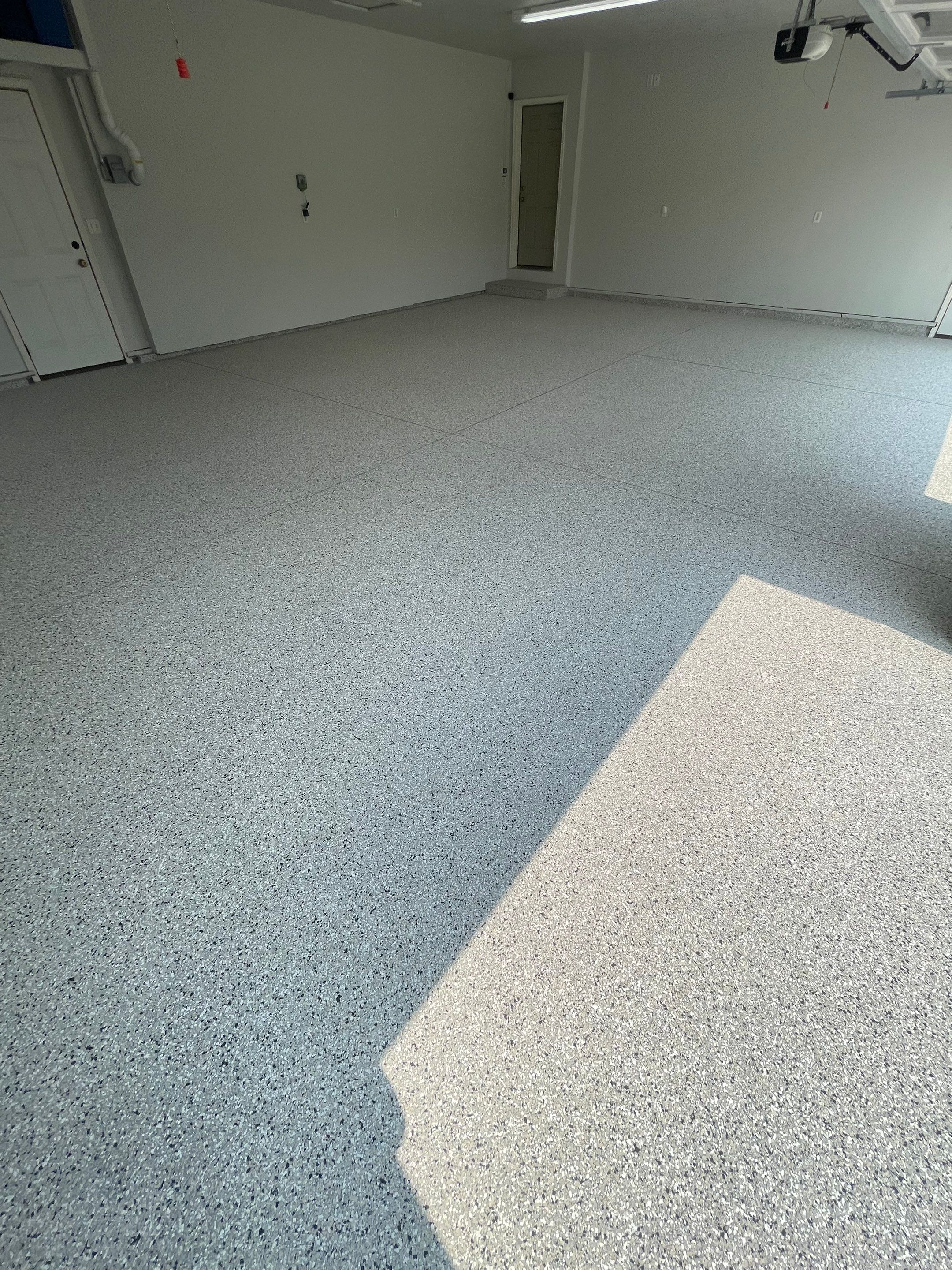 Multi-Car Garage Floor Coating and Crack Repair in Tea by Select Painting, Coatings & Garage Cabinets