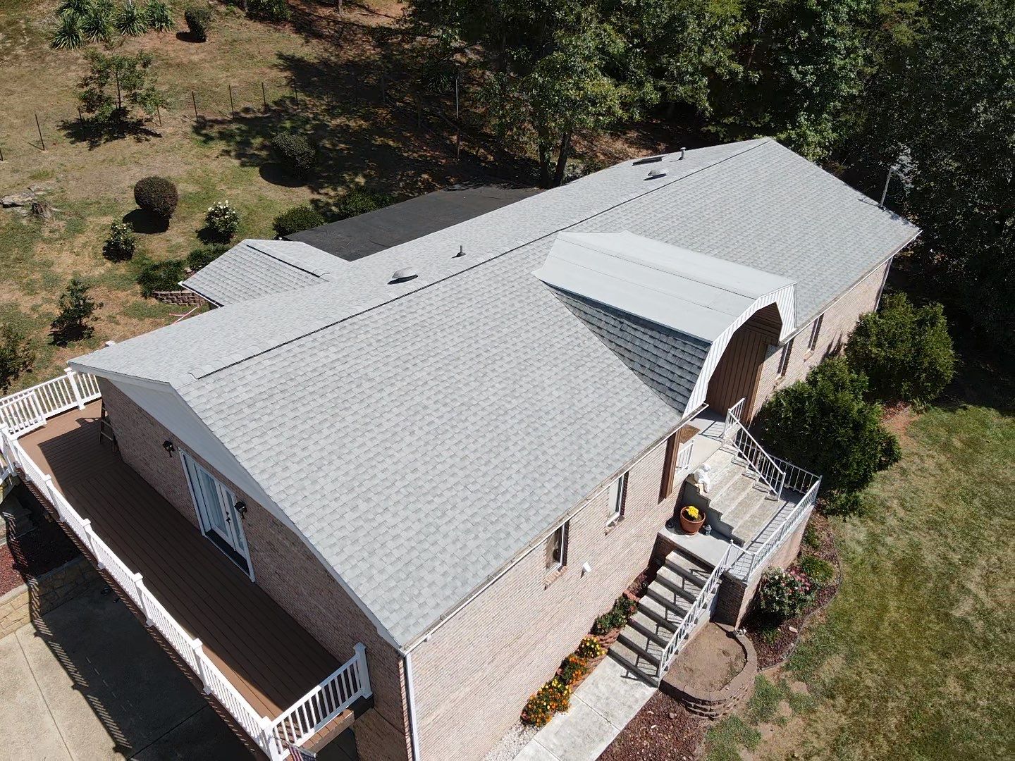 Residential Roofing Installation using GAF Timberline HDZ Fox Hollow Grey by Rainstoppers Roofing