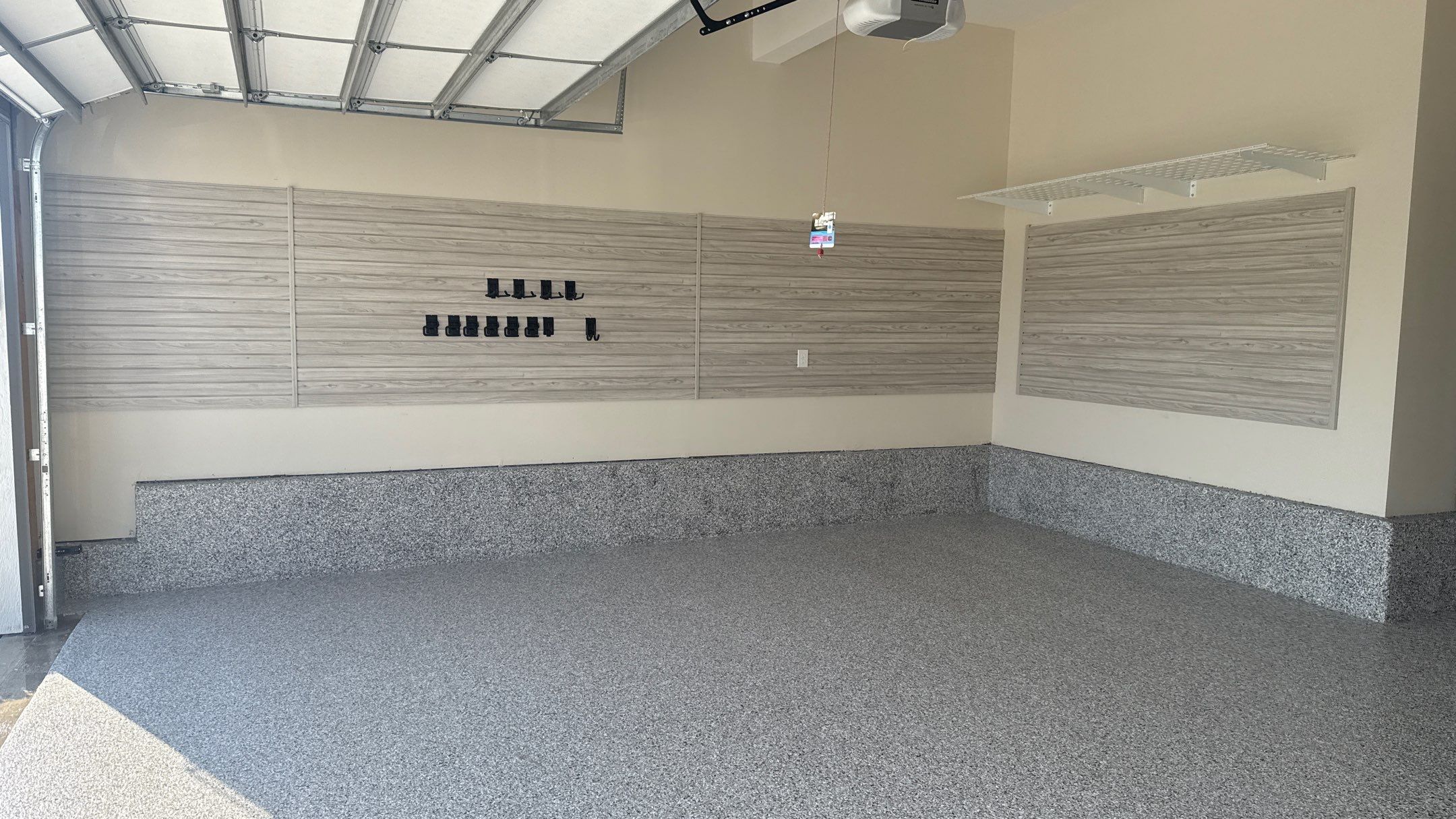 Wendy's Floor And Storage Makes All The Difference by Banner Garage