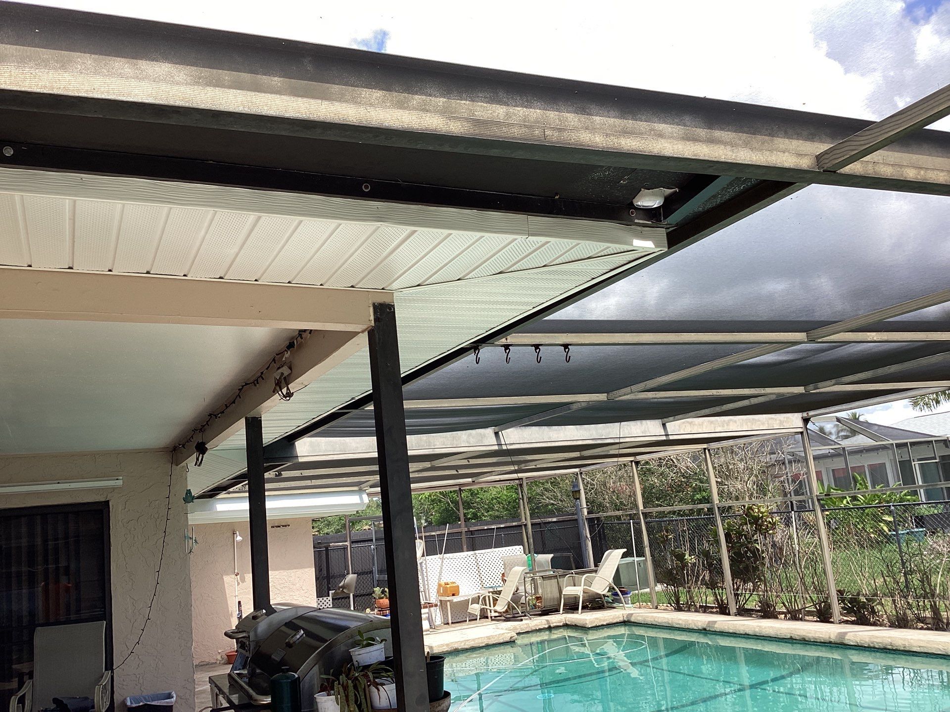 White Seamless Gutters and Splash Guards in Fort Myers FL by Gutter Professor by Gutter Professors