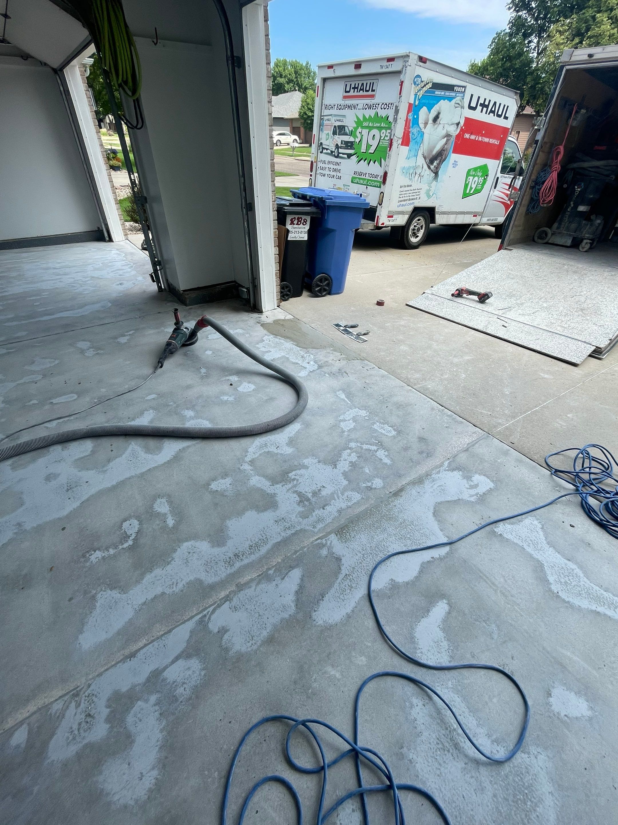 Multi-Car Garage Concrete Coating with Coyote Flake Finish in Sioux Falls by Select Painting, Coatings & Garage Cabinets