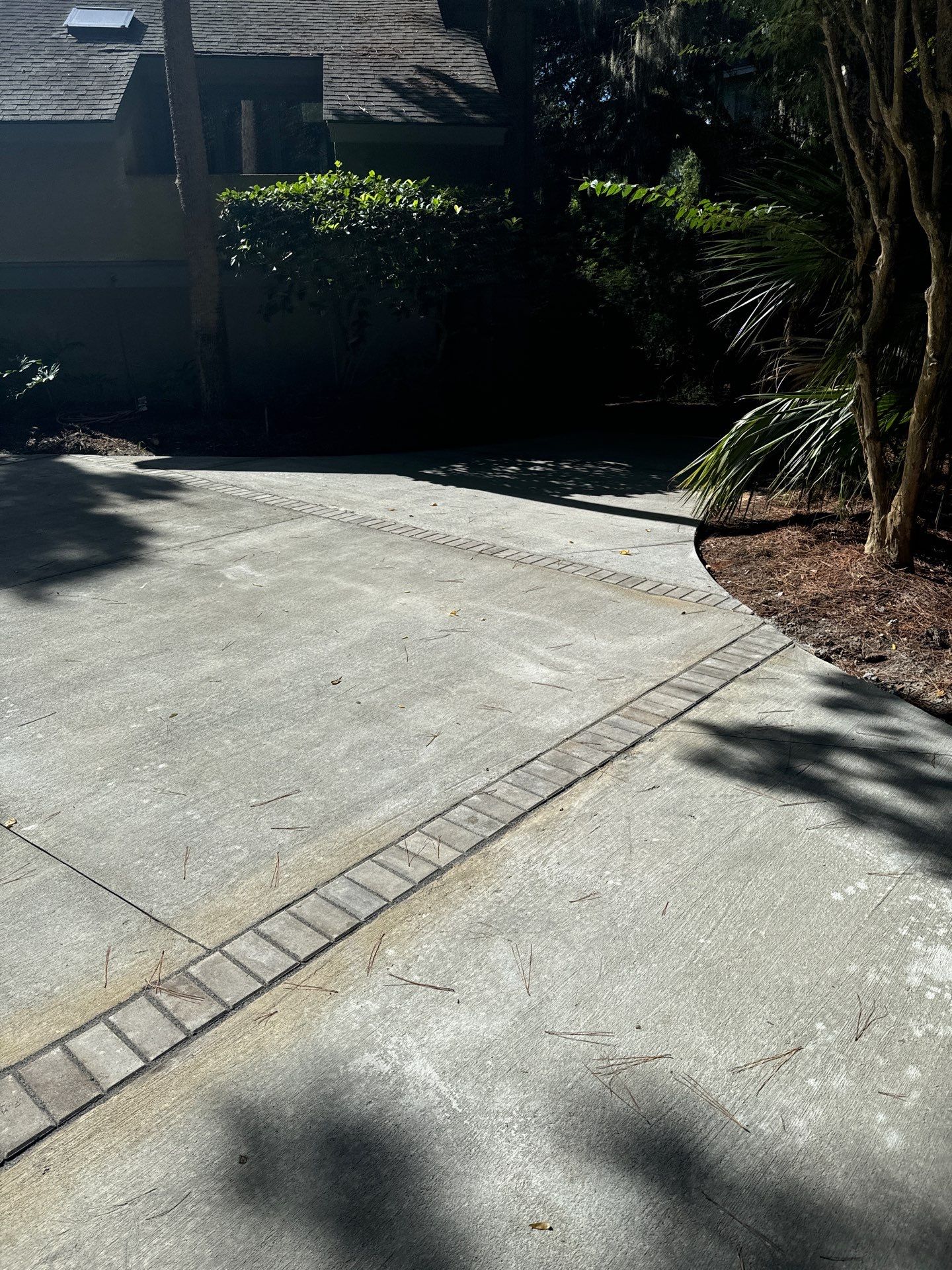 Hilton Head Island Concrete Driveway Replacement with Decorative Paver Borders by Lowcountry Scapes, LLC