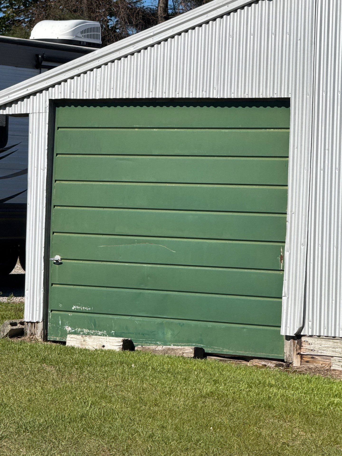 Exterior Painting and Trim Restoration for Mears Metal Buildings by Gordon Painting