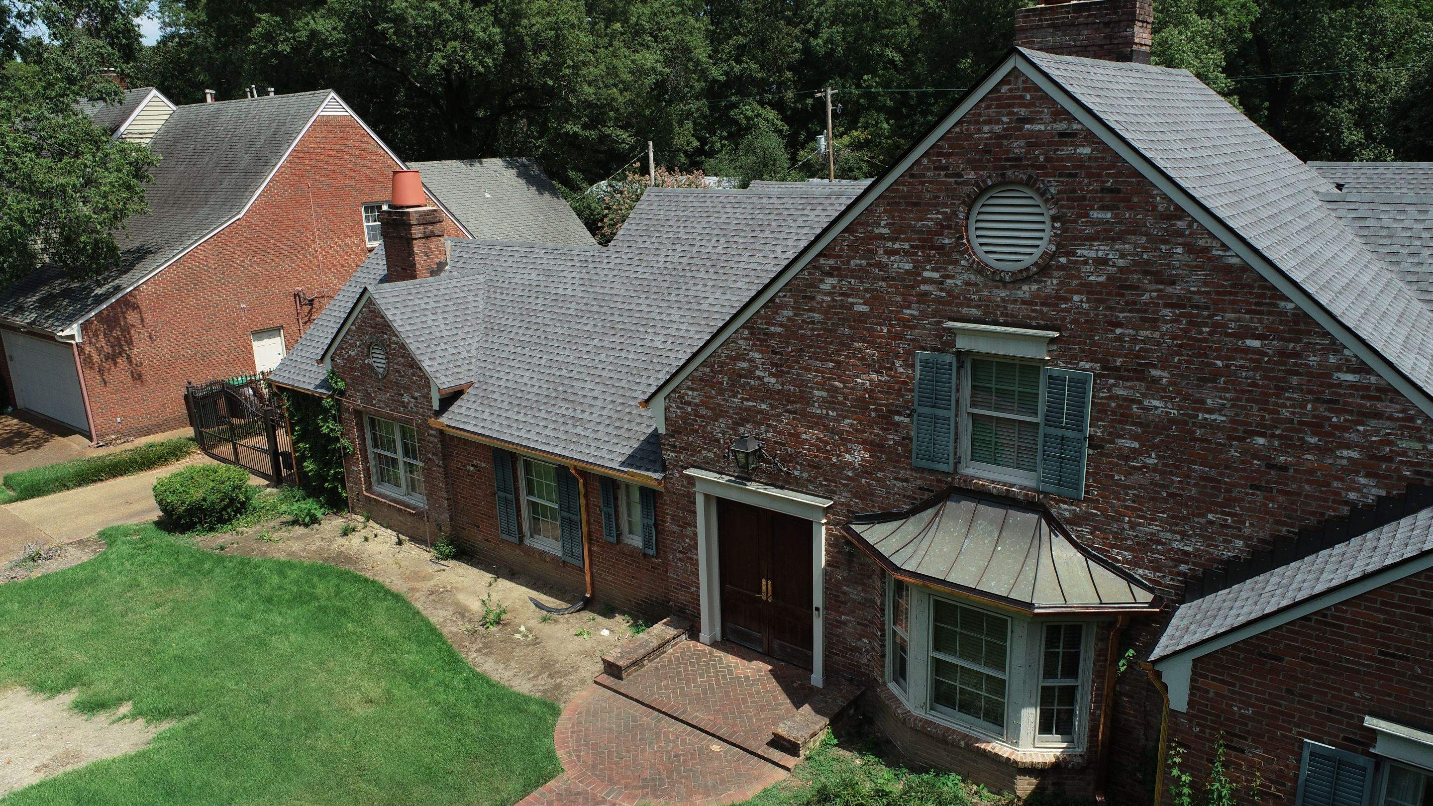 Full Roof Replacement with gutter upgrade after tree impact damage in East Memphis by Revival Roofing Services