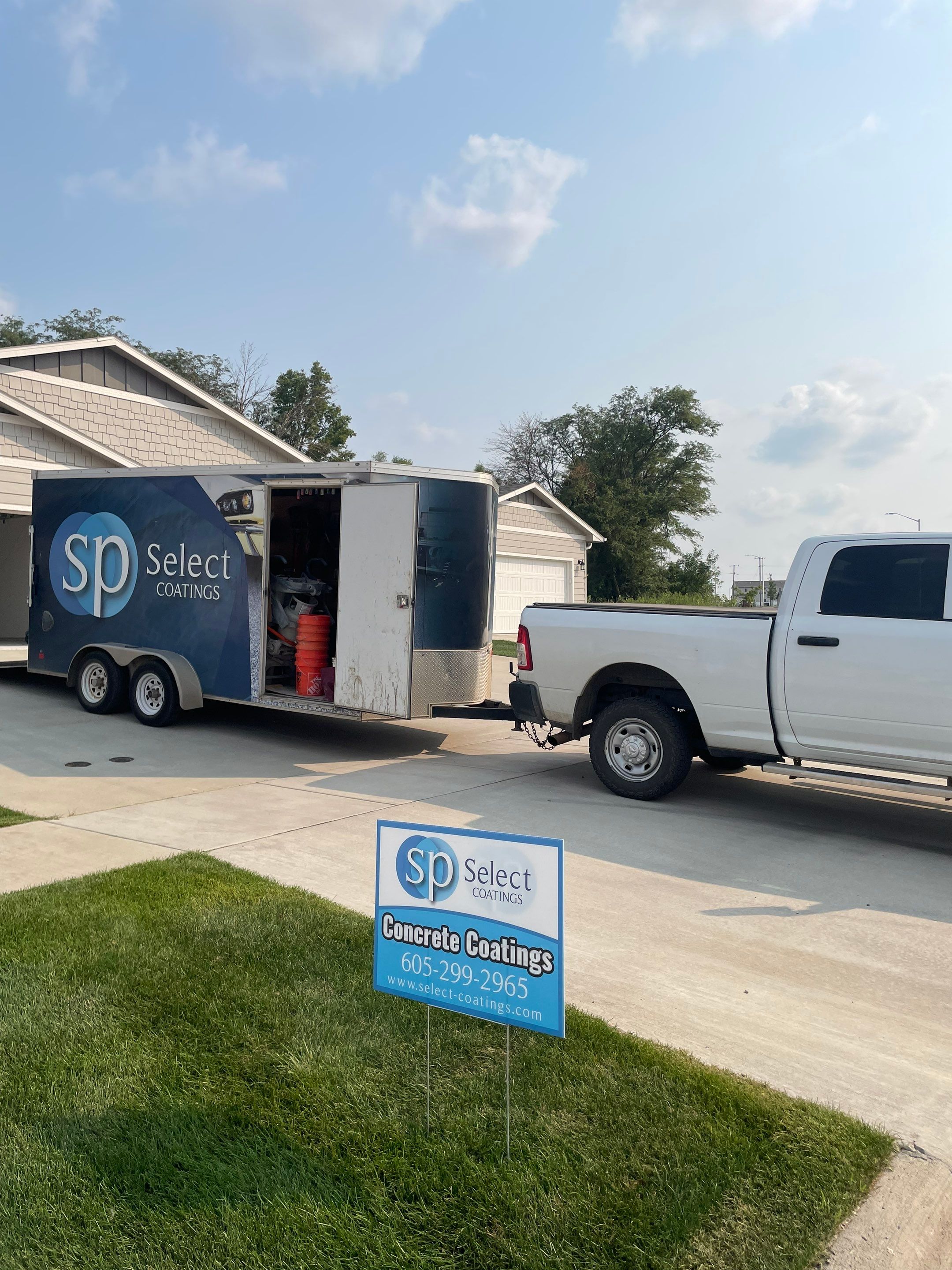 Custom Coyote Flake Garage Floor Coating in Sioux Falls by Select Painting, Coatings & Garage Cabinets