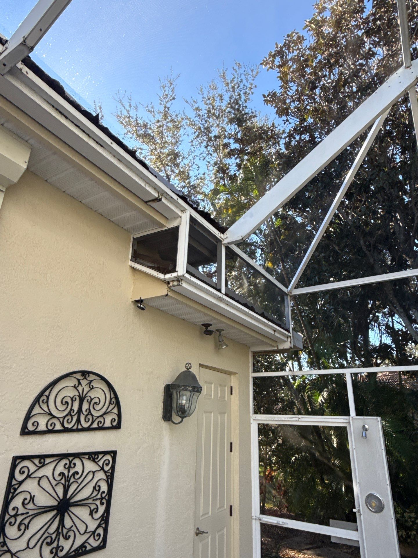 Clean Gutters Entire House and reseal corners in Sarasota FL by Gutter Professors